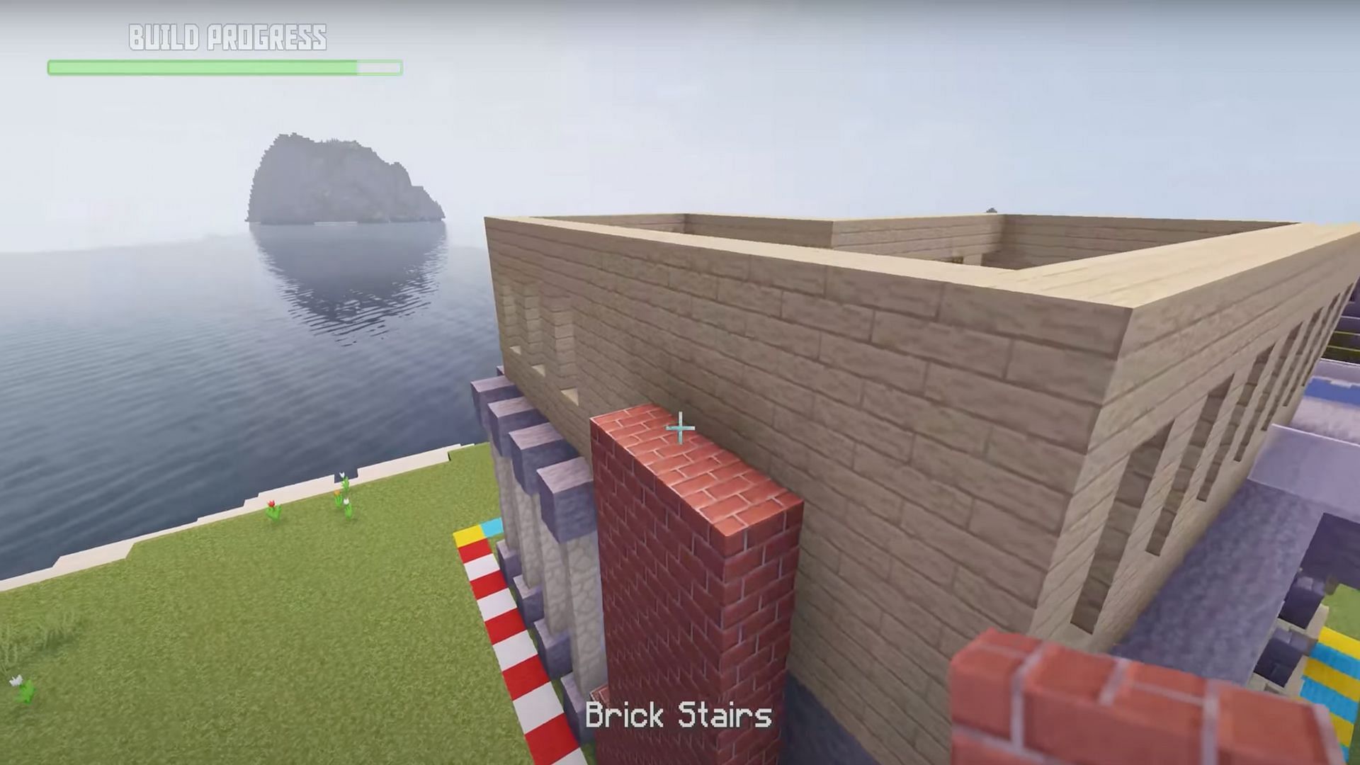 Players can add finishing touches such as glass railings and even a chimney to the house (Image via Greg Builds/YouTube)
