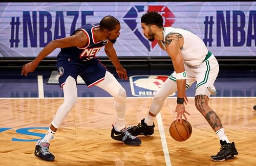 Boston Celtics v Brooklyn Nets - Game Four; Jayson Tatum handles the ball against Kevin Durant