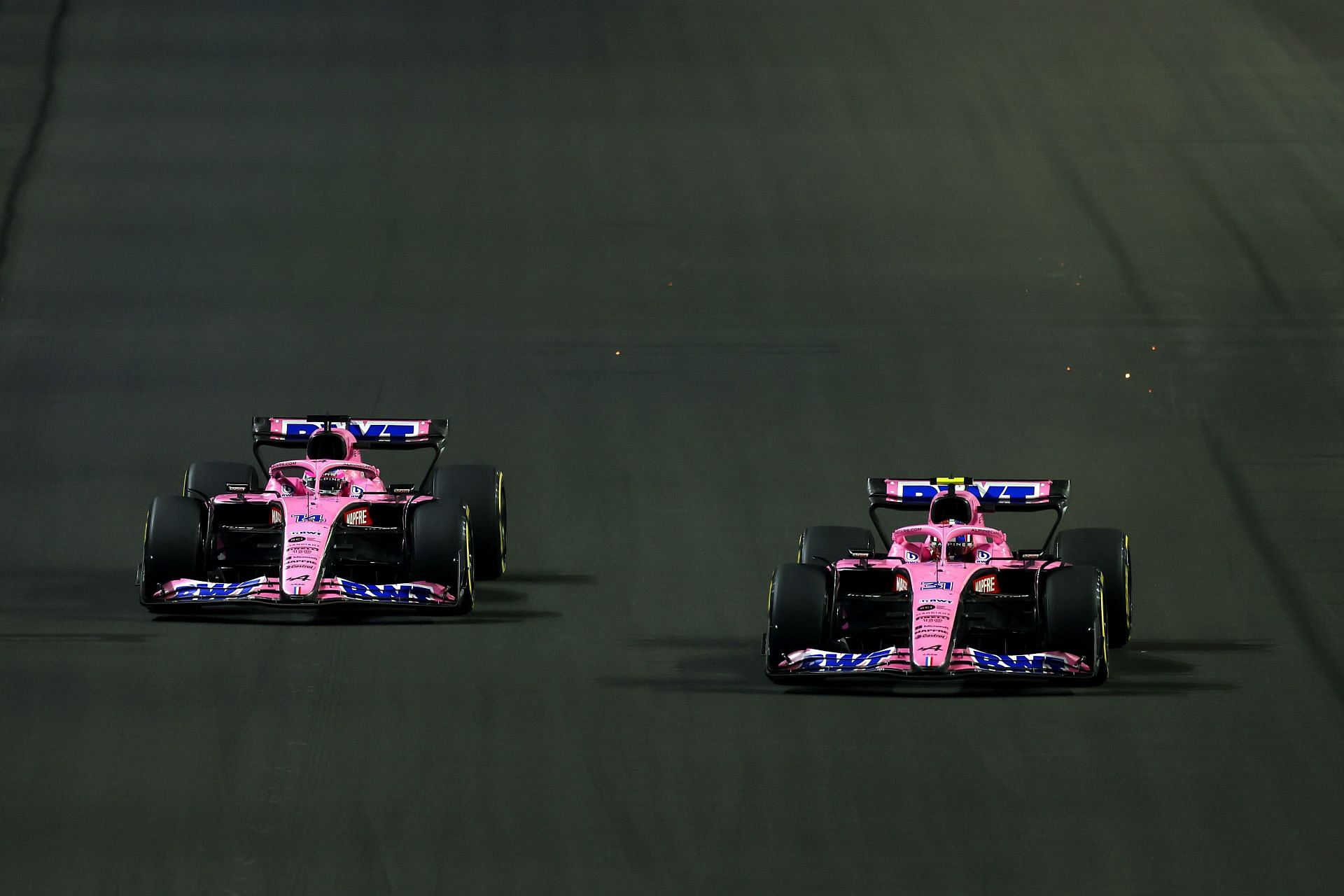 Fernando Alonso (left) dueling Alpine teammate Esteban Ocon (right) during the 2022 F1 Saudi Arabian GP (Photo by Lars Baron/Getty Images)