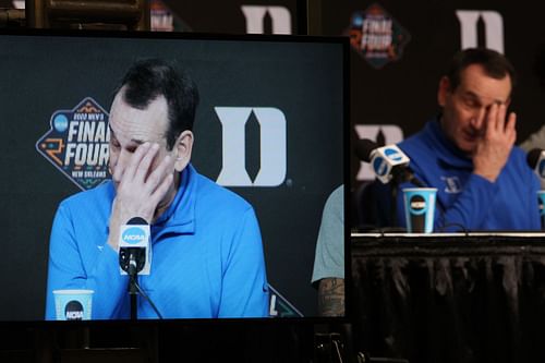 Coach K wipes his eyes after Duke's elimination from March Madness.