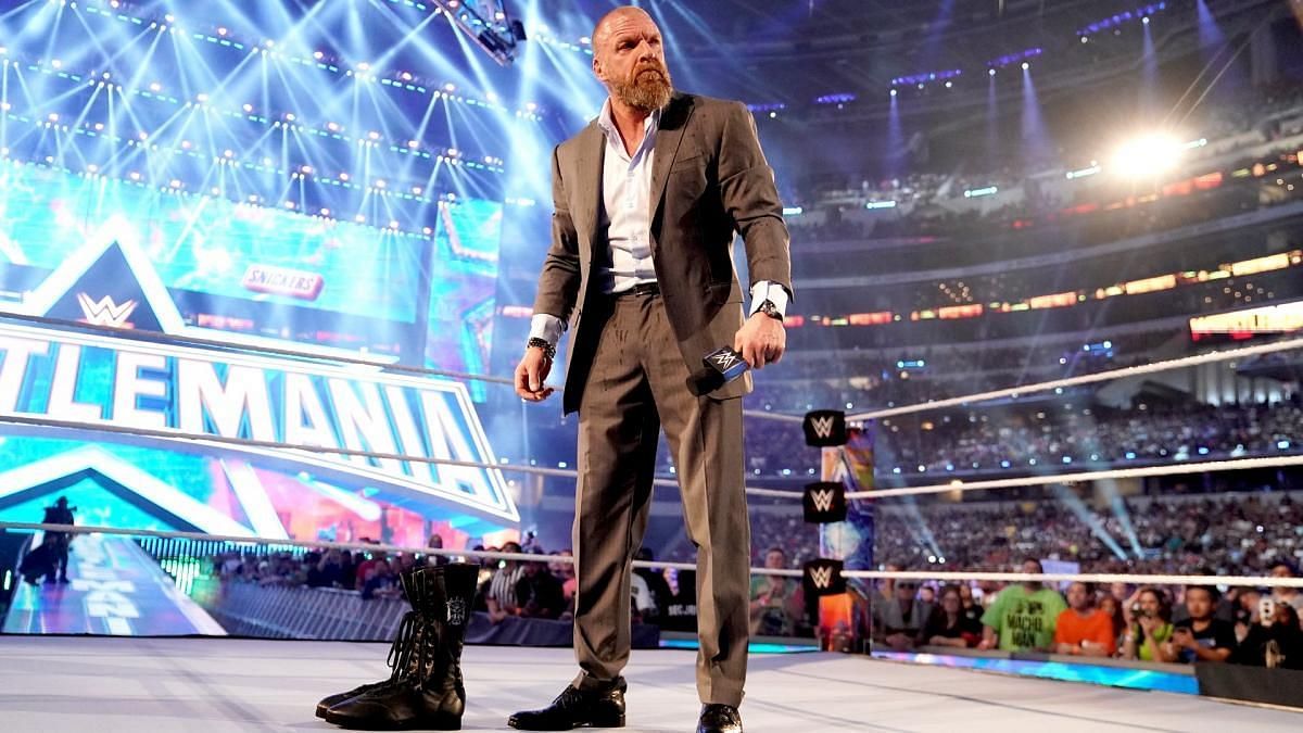 The Game signified his retirement by leaving his boots in the ring