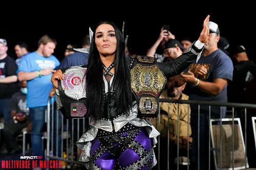 'The Virtuosa' Deonna Purrazzo strutting with two highly prestigious championships.