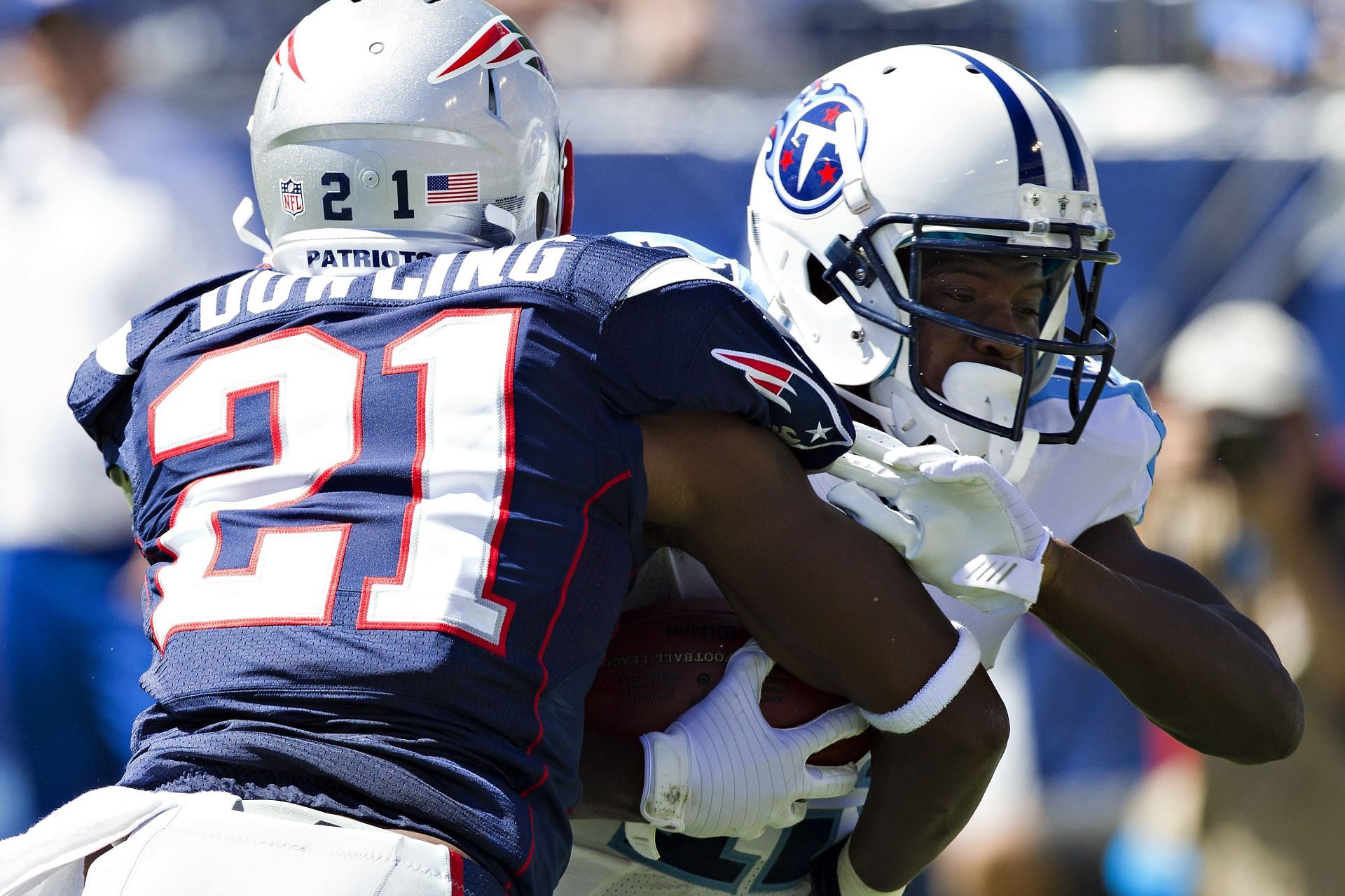 New England Patriots cornerback Ras-I Dowling making a tackle against the Tennessee Titans