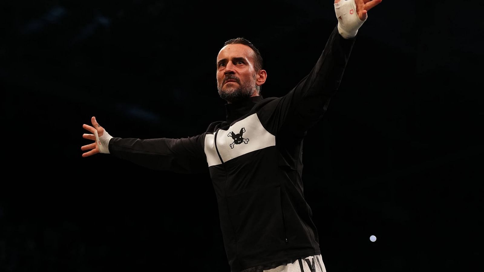 CM Punk before his Dog Collar Match at AEW Revolution, wearing his ROH inspired gear.