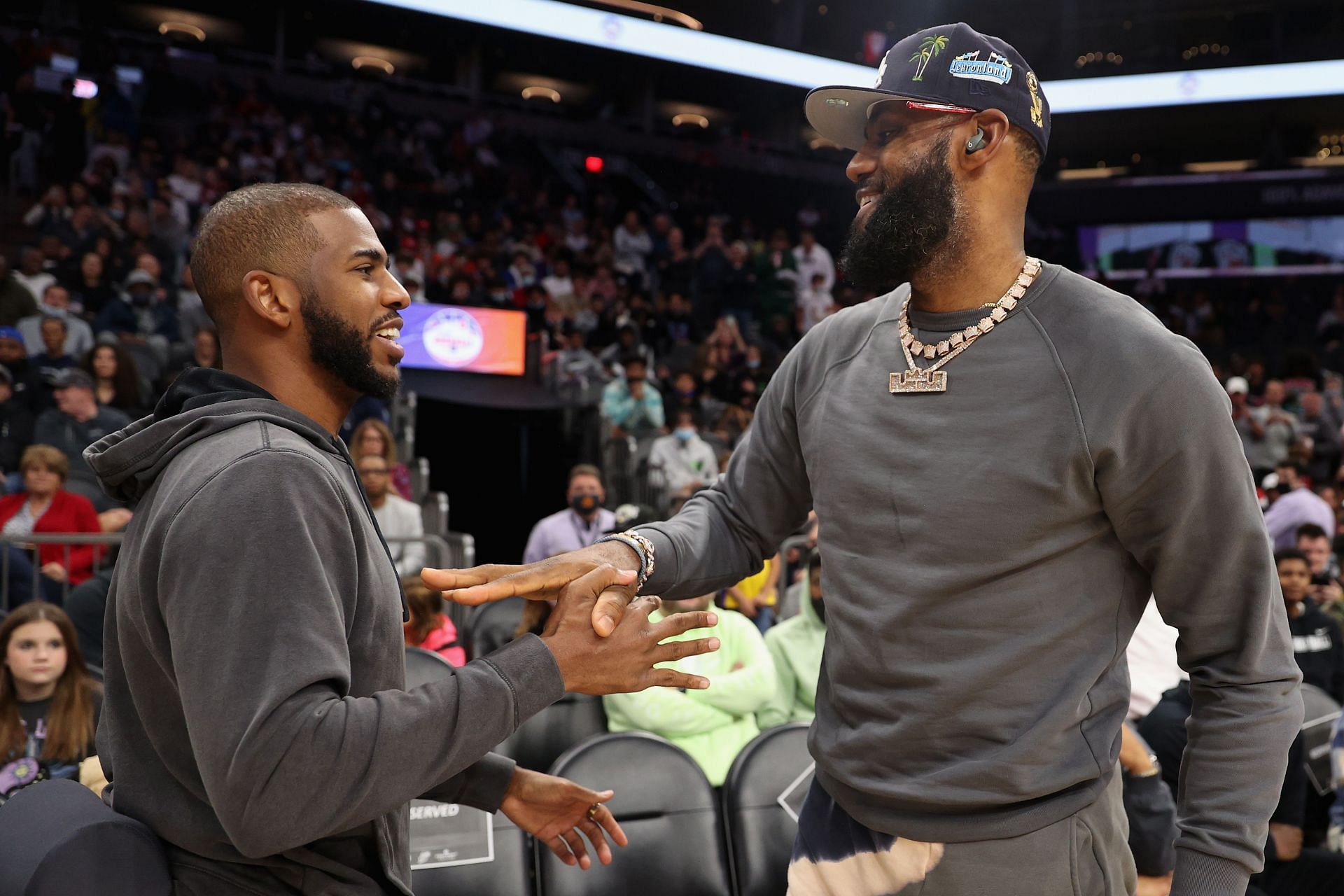 Chris Paul of the Phoenix Suns and LeBron James of the LA Lakers high five.
