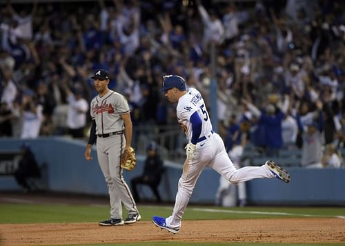 Freddie Freeman rounds the bases after hitting a home run off his former team. Atlanta Braves v Los Angeles Dodgers