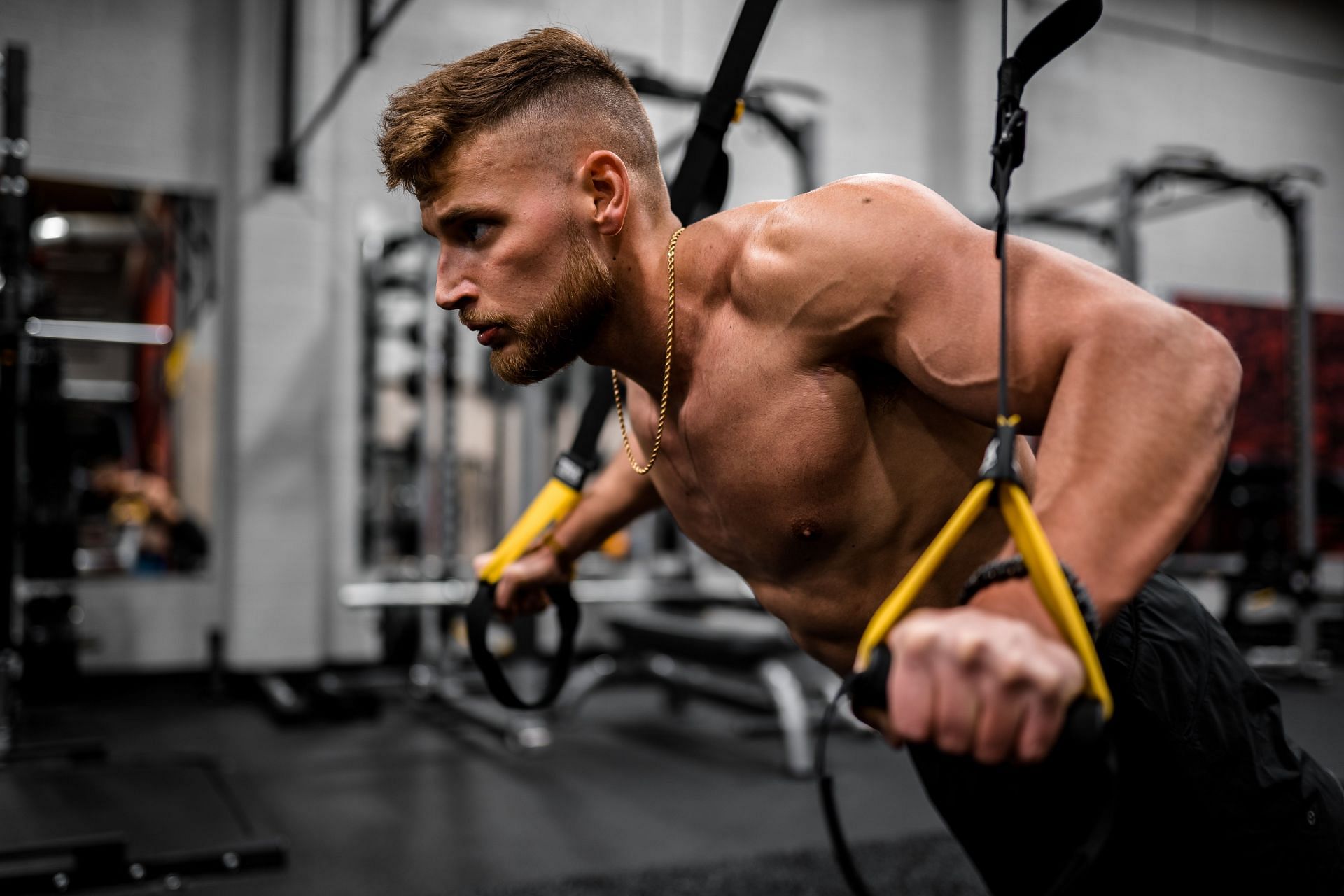 Cable fly is great for improving upper body strength (Image via unspash/Anastase Maragos)