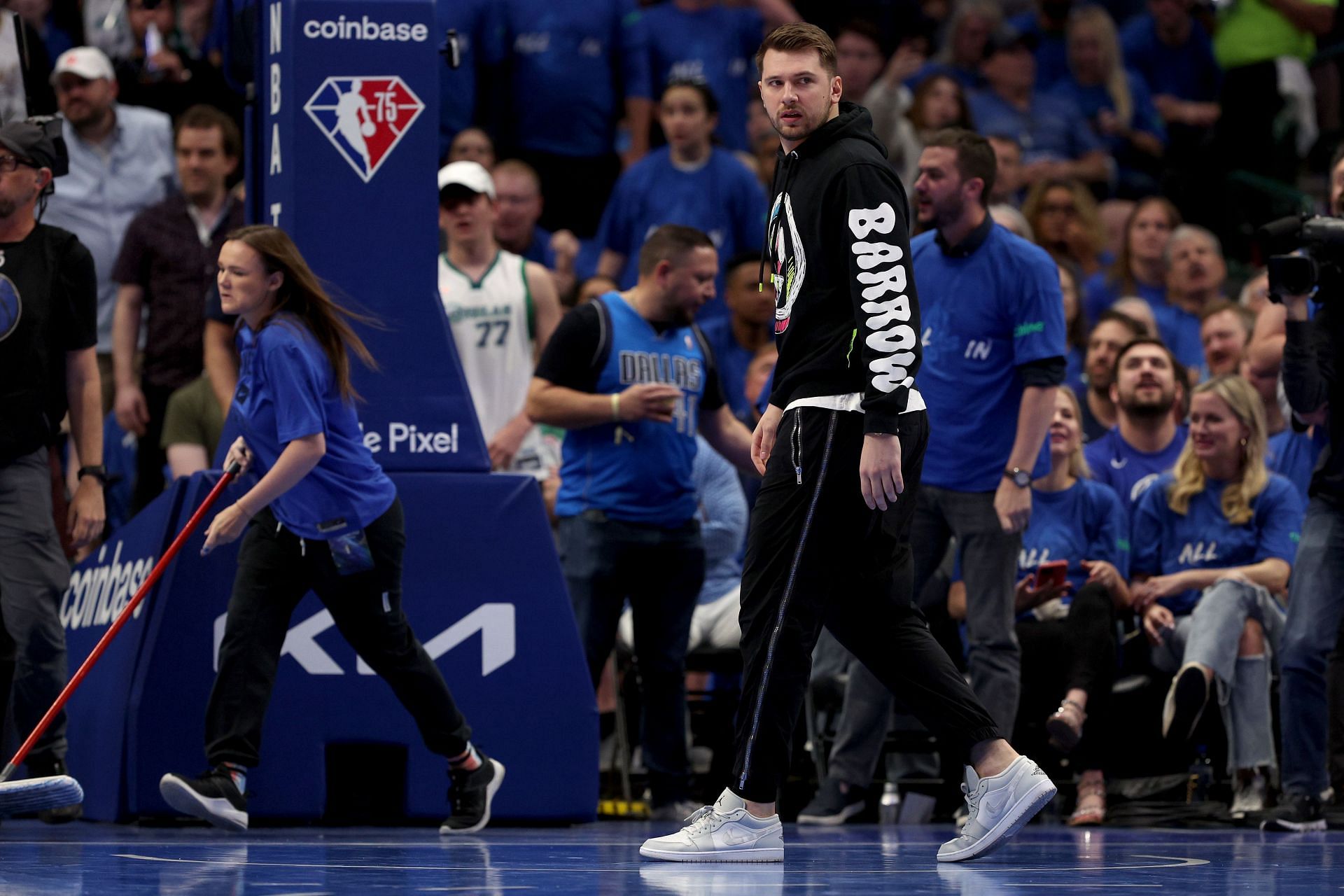 Luka Doncic looks on at the playoff action