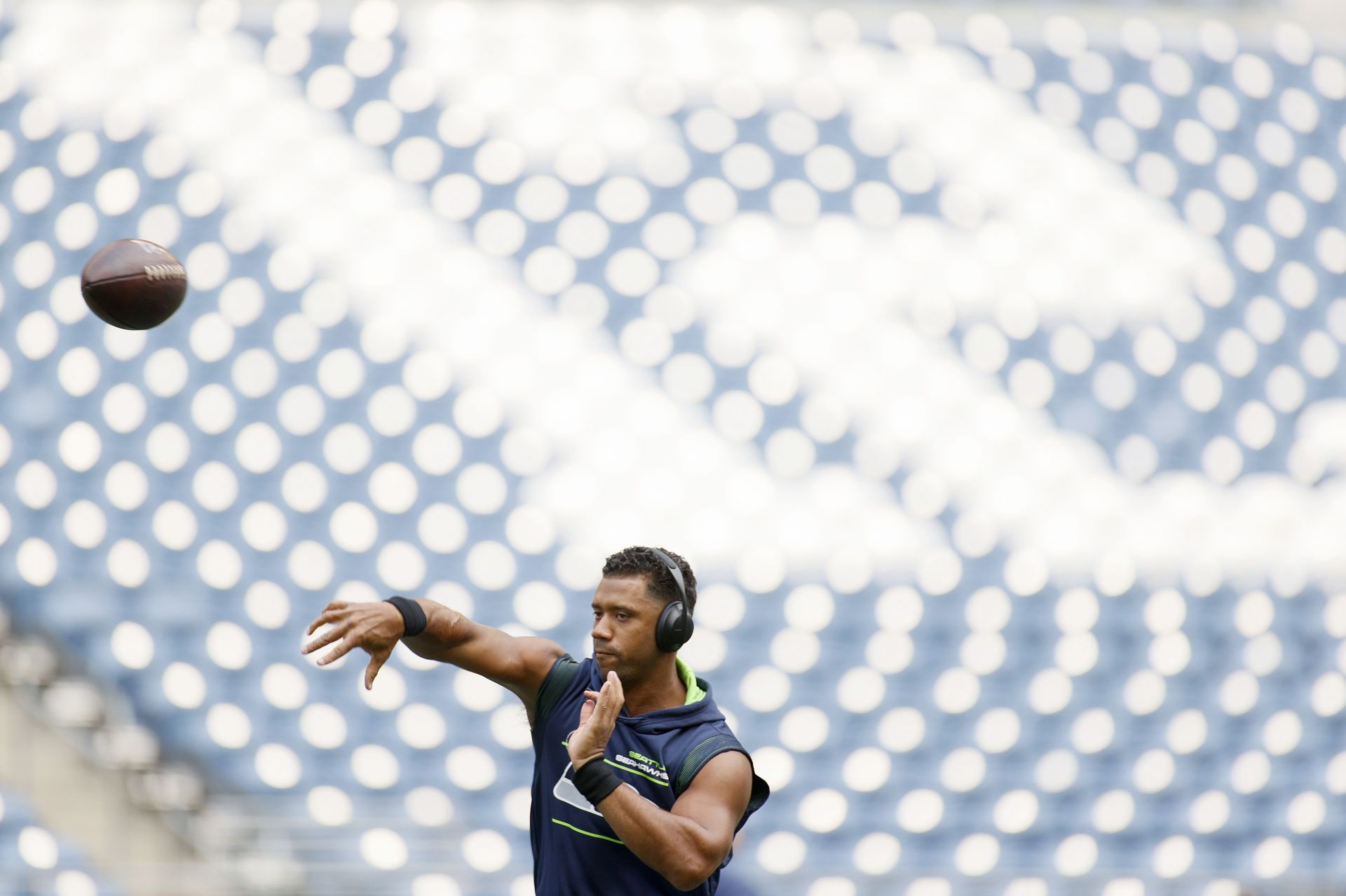 Russell Wilson delivered a rocket throw into the arena crowd.