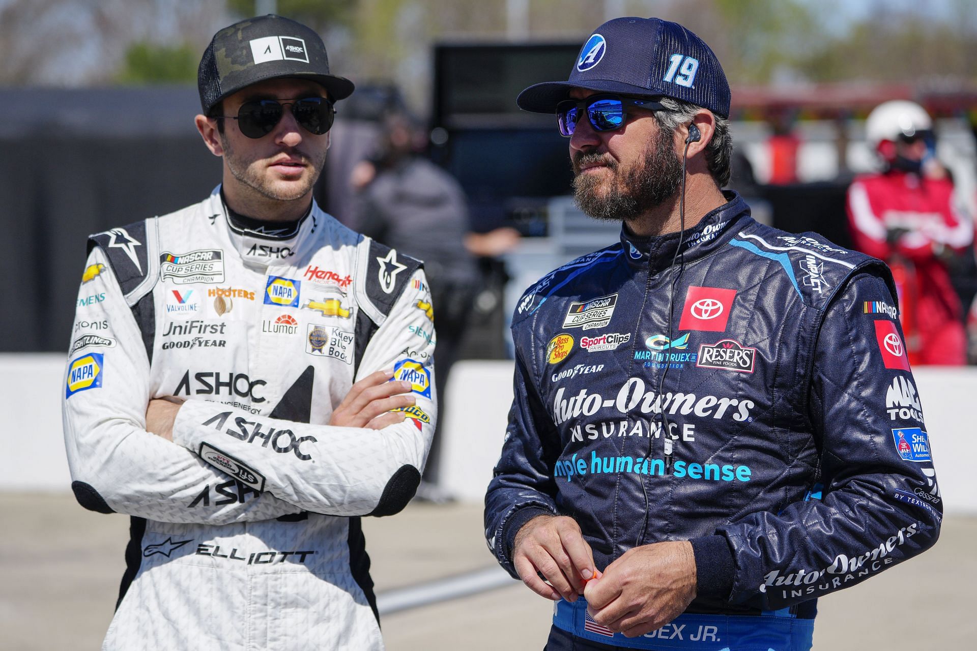 Chase Elliott (Left) and Martin Truex Jr. (Right) talk on the grid during qualifying for the NASCAR Cup Series Toyota Owners 400.