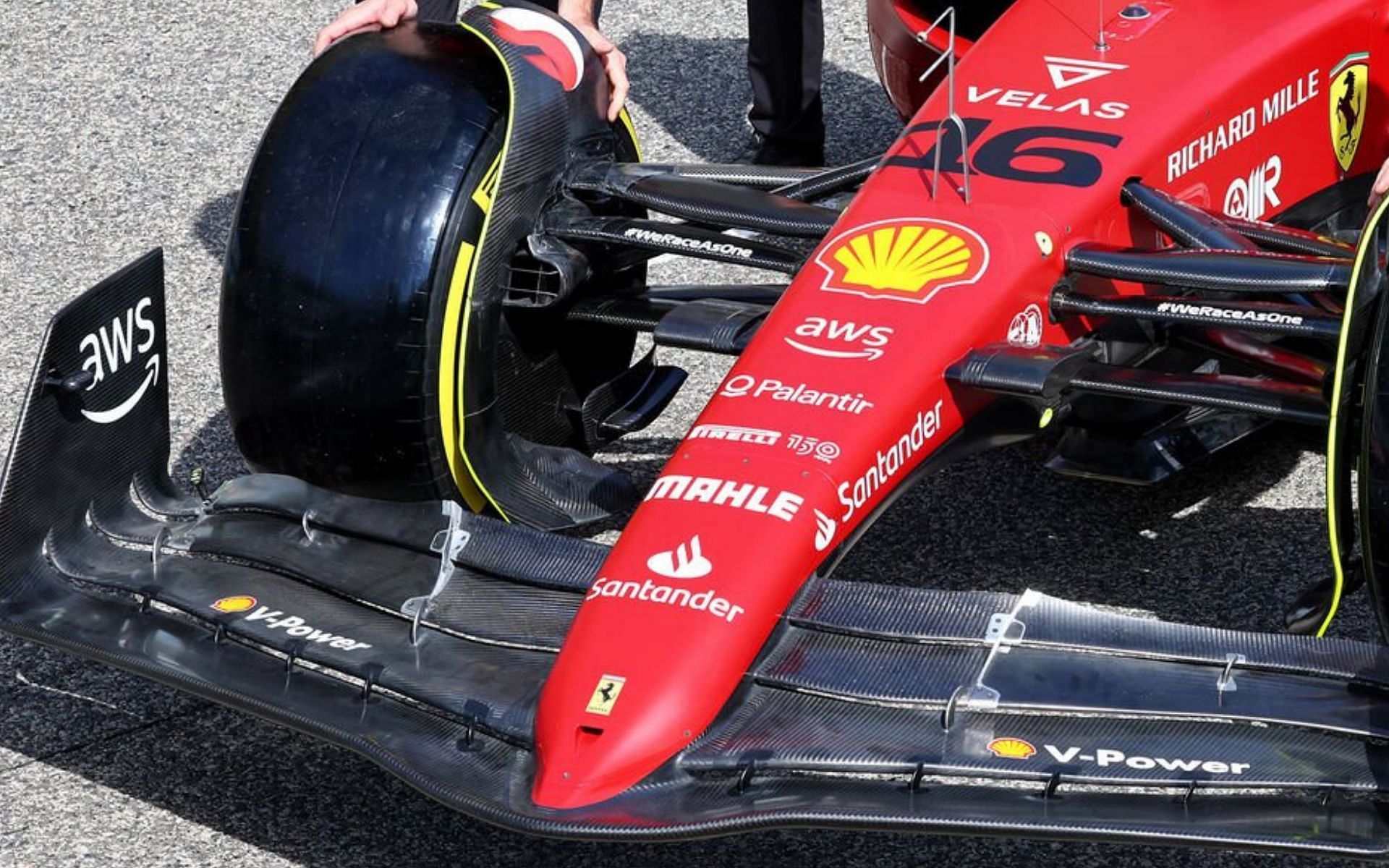 The carbon fiber front wing of the Ferrari F1-75, like most cars on the grid this season, is left exposed rather than being painted.