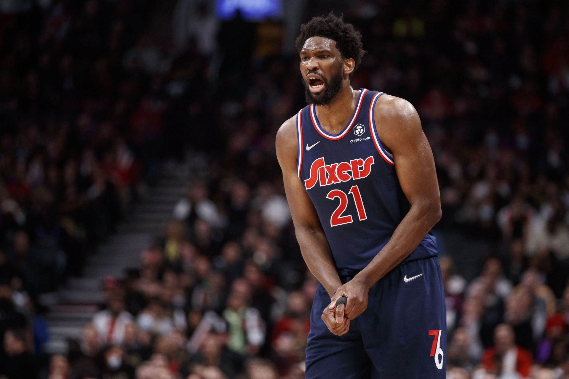 Joel Embiid No. 21 of the Philadelphia 76ers holds his thumb in the second half of Game 3 of the Eastern Conference First Round.