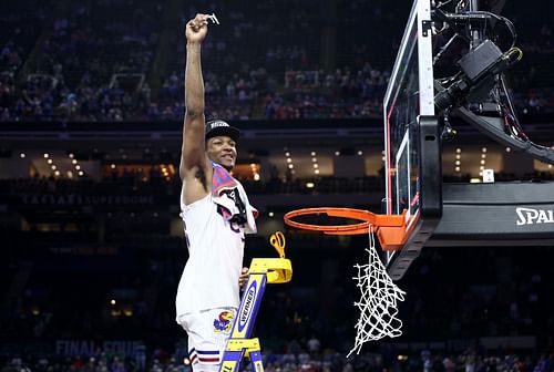 Dave McCormack celebrates as Kansas tops UNC in the national championship game.