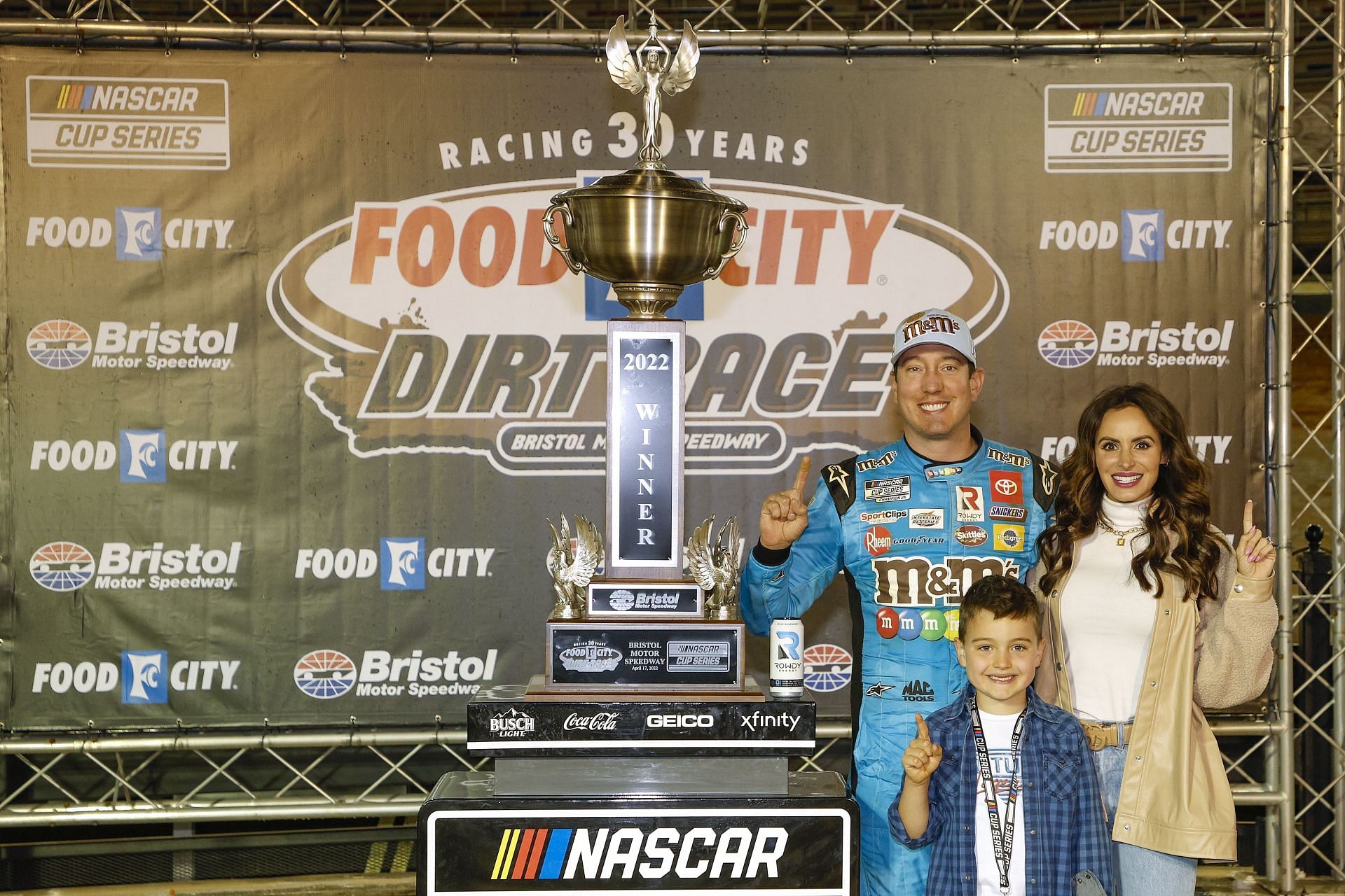 Kyle Busch and his family celebrate in victory lane after winning the 2022 NASCAR Cup Series Food City Dirt Race at Bristol Motor Speedway in Tennessee. (Photo by Chris Graythen/Getty Images)