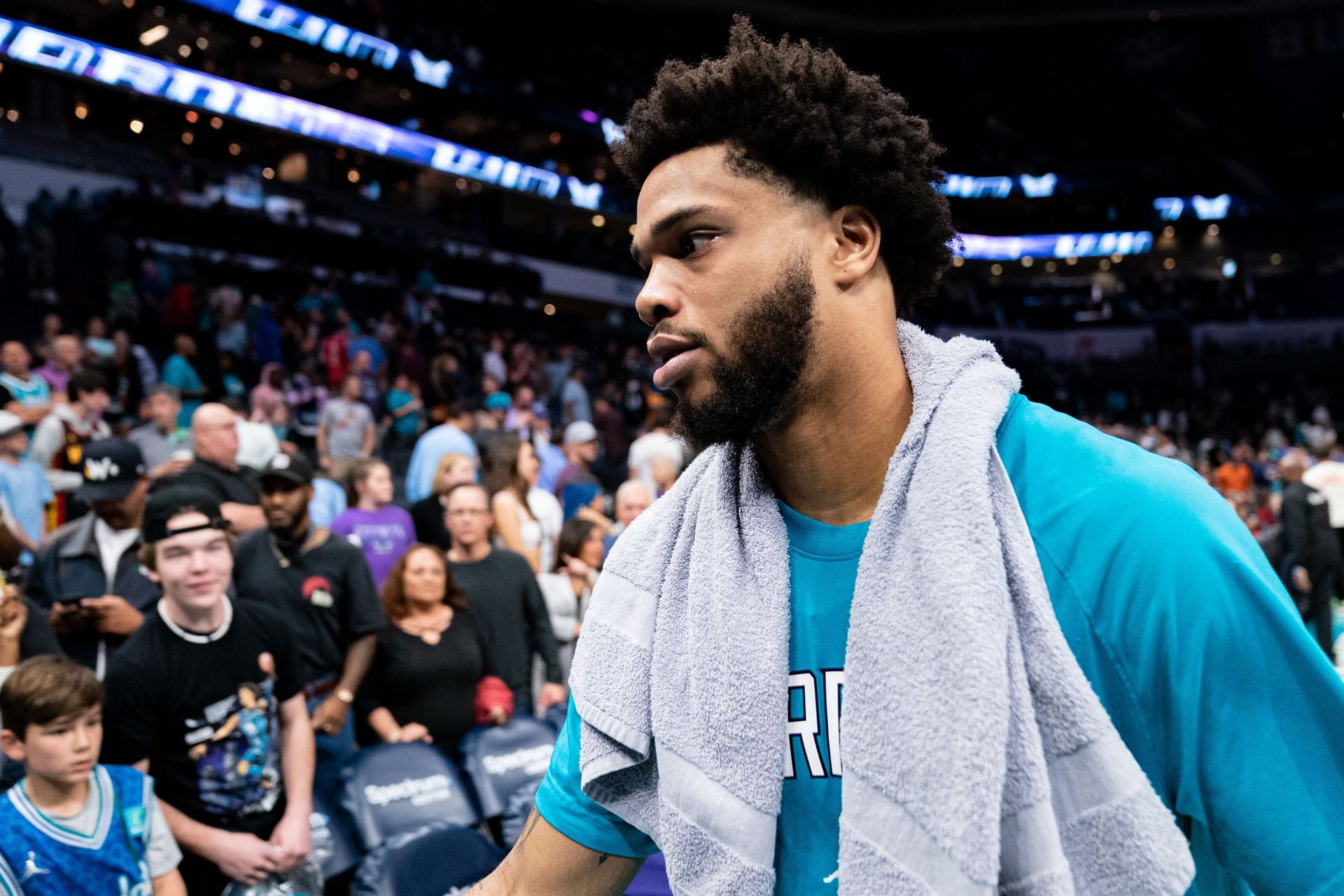 Miles Bridges of the Charlotte Hornets walks off the court after defeating the Orlando Magic during their game at Spectrum Center on April 7 in Charlotte, North Carolina.