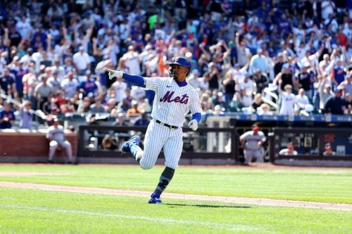 Francisco Lindor celebrates hitting a home run in front of the home crowd in Queens