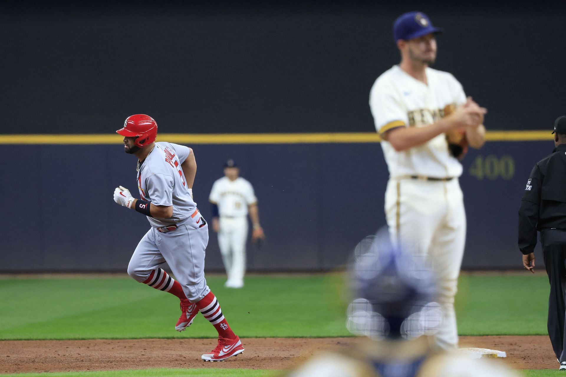 Albert Pujols rounds the bases after a game-tying three-run home run against the Milwaukee Brewers April 17.
