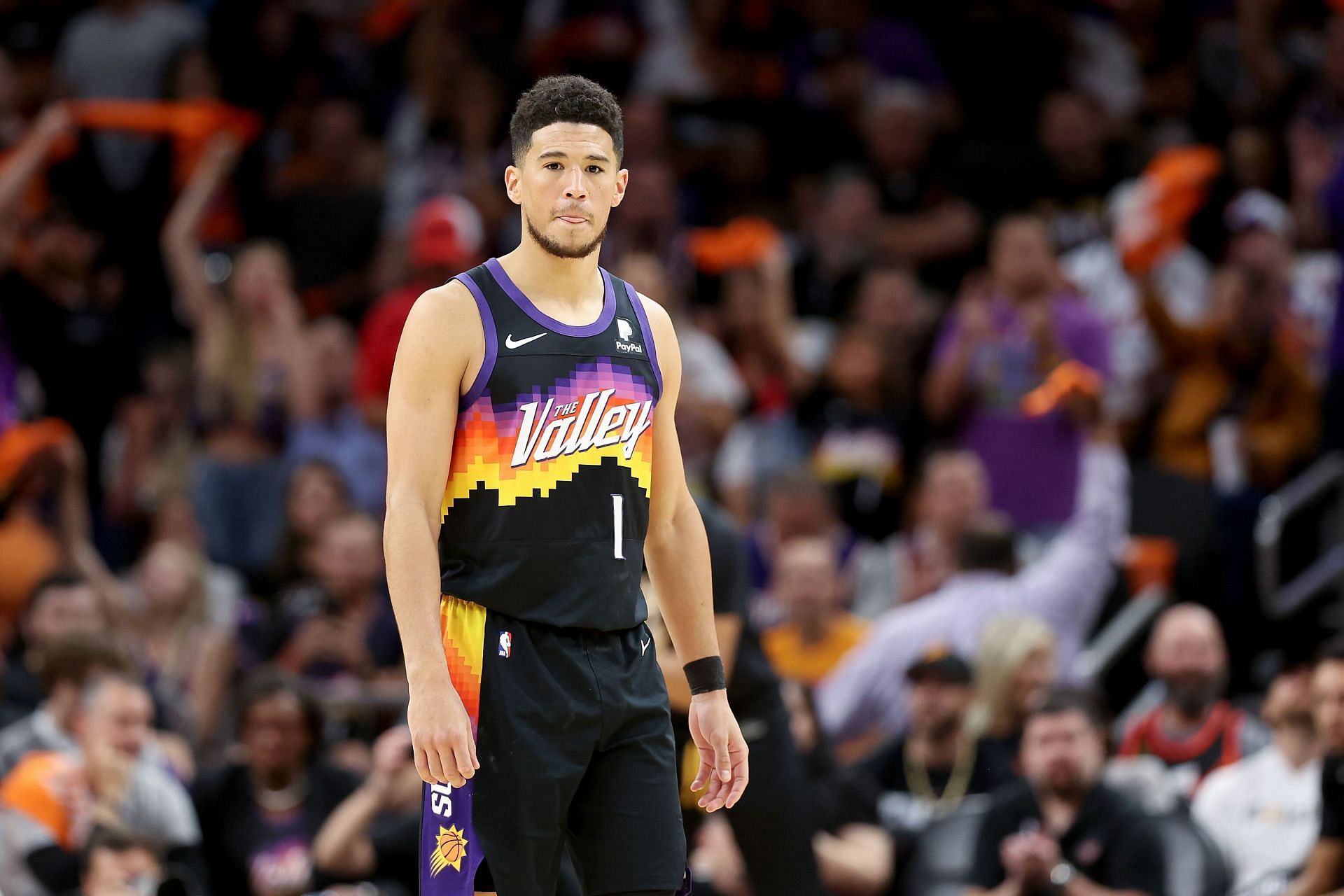 Devin Booker suffered a hamstring injury while on transition defense
