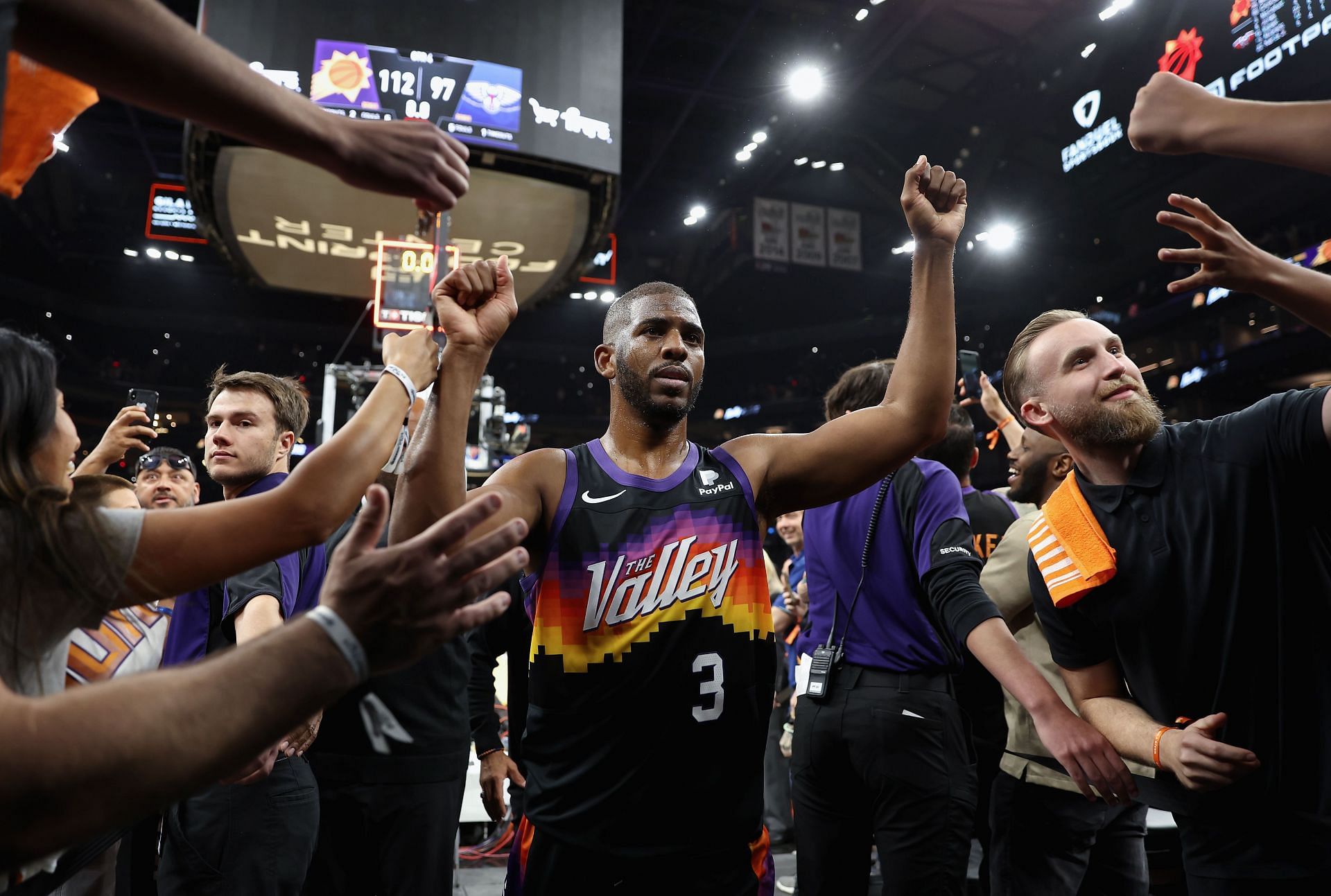 Chris Paul celebrates the win with the fans