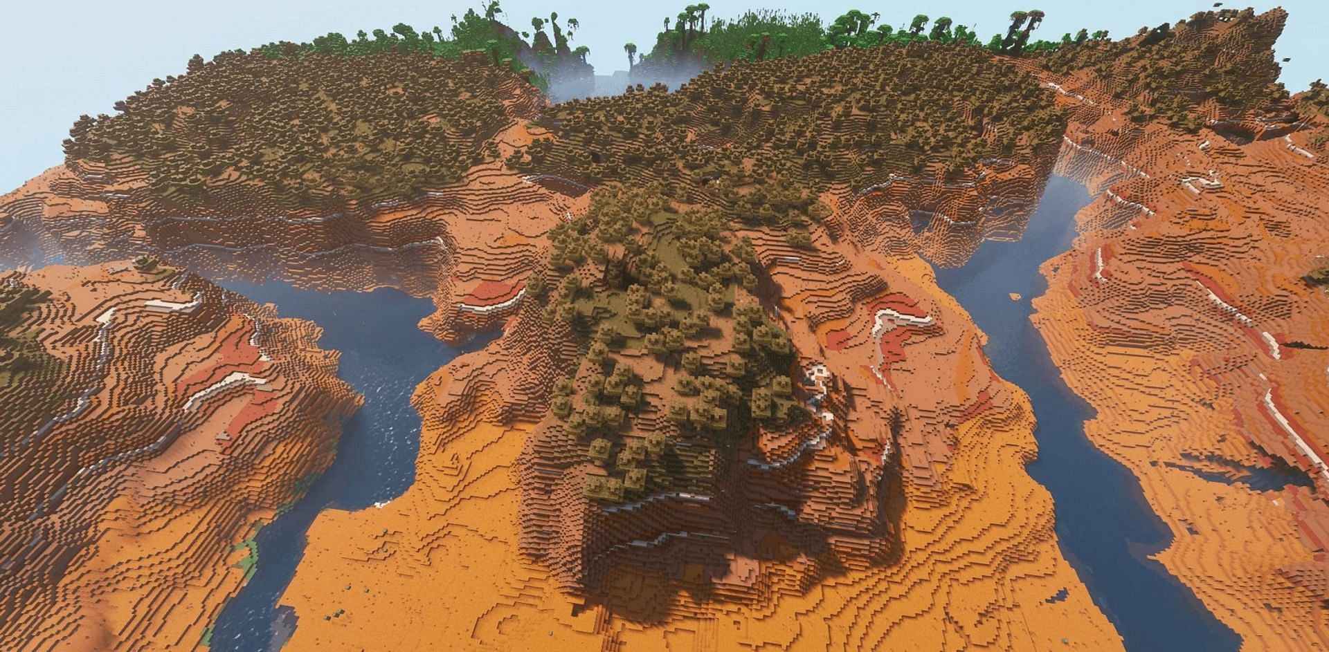 Players can reap the benefits of both a jungle and badlands biome a short trip away from this seed&#039;s spawn point (Image via u/Rangolikesbeans/Reddit)