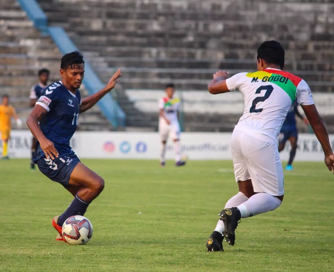 Kenkre FC&#039;s Ranjeet Singh Pandhre in action against TRAU FC&#039;s Manash Protim Gogoi (Image Courtesy: Kenkre FC Instagram)