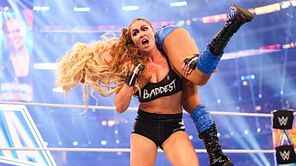 Top champion takes a shot at Ronda Rousey following her loss at WrestleMania 38