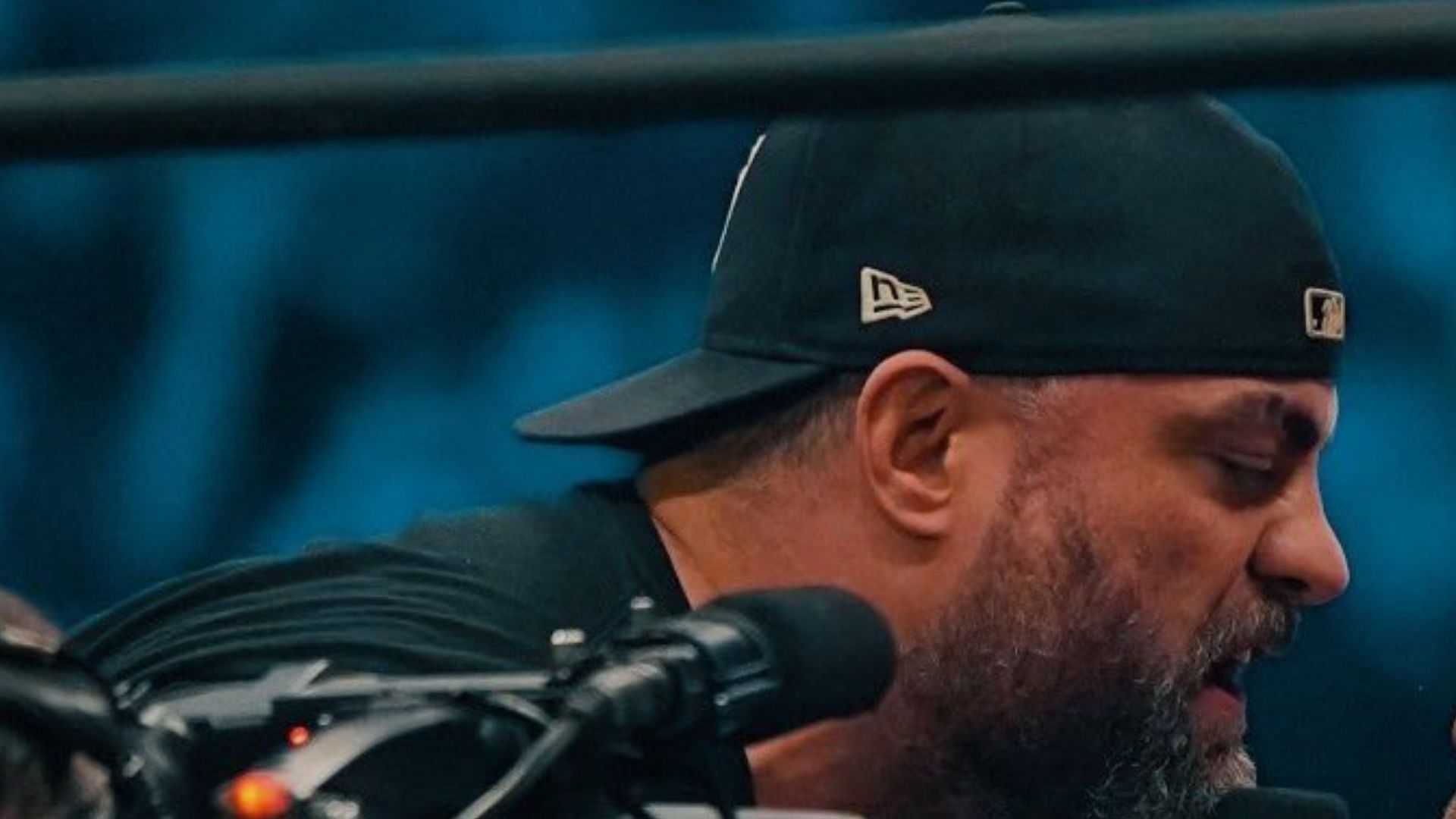 Eddie Kingston cutting a promo at an AEW event.