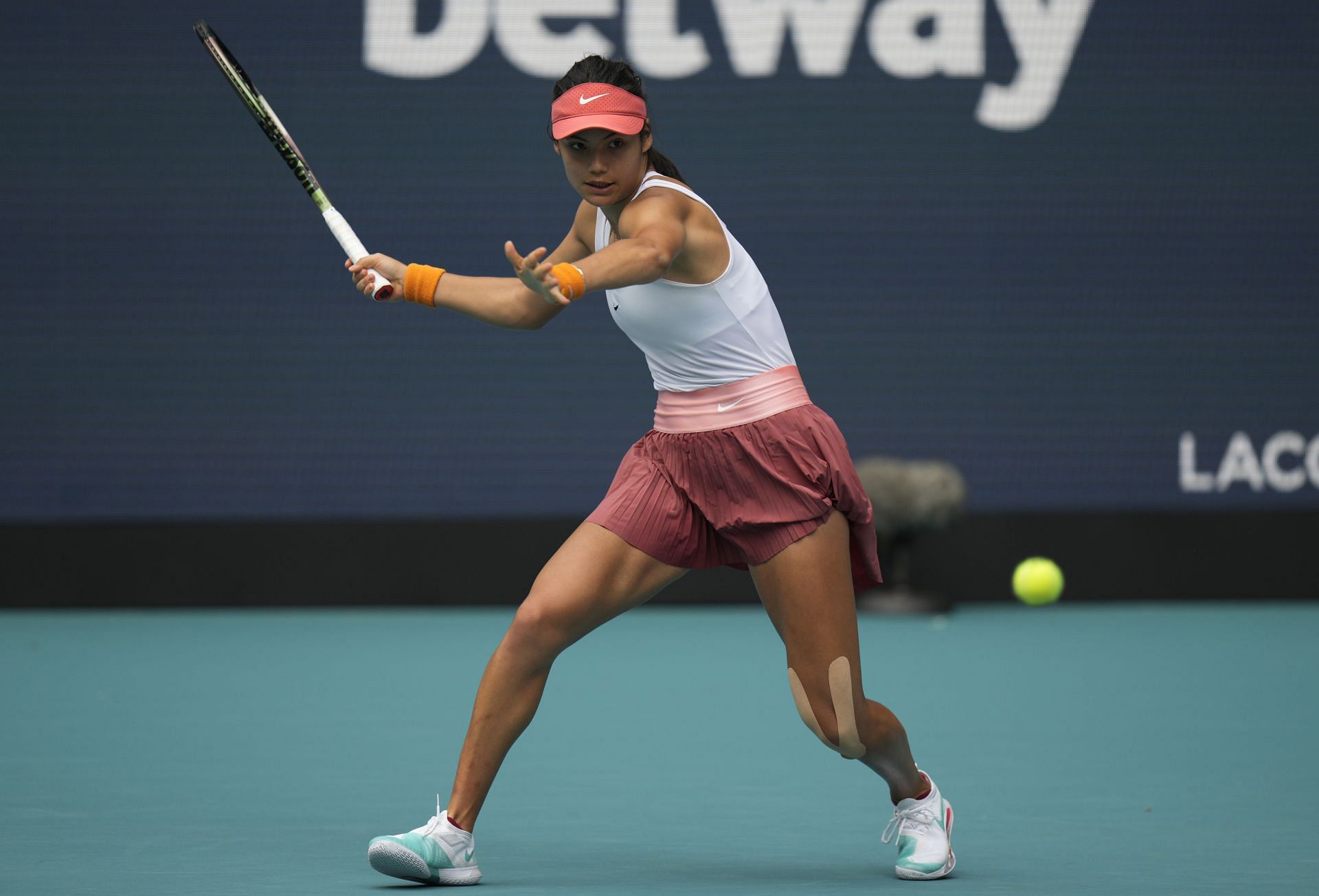 Emma Raducanu strikes a forehand in Miami.