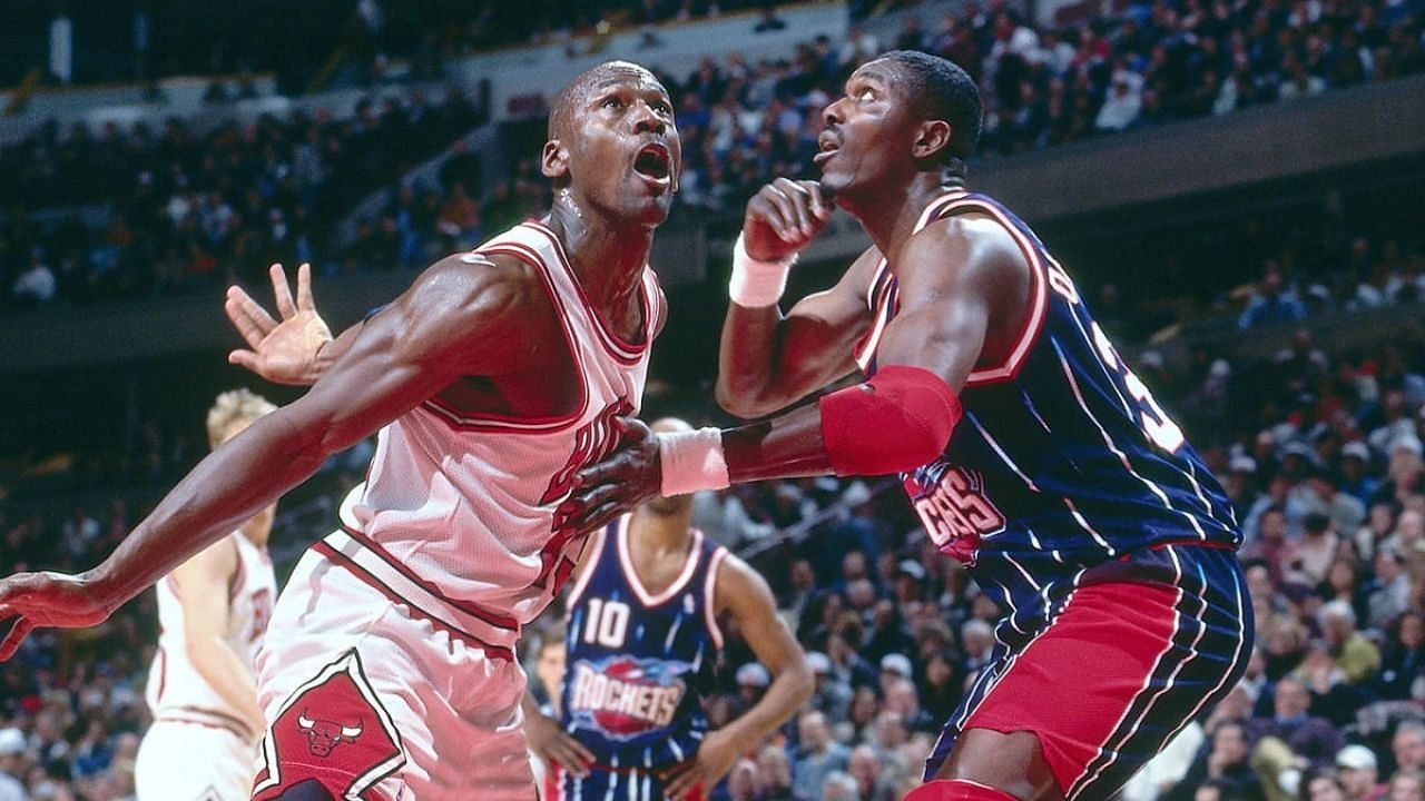 Michael Jordan and Hakeem Olajuwon. (Photo: TheSportsRush)
