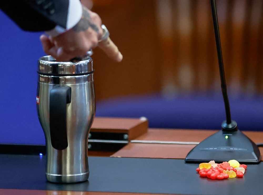 Johnny Depp snacks on gummy bears during court proceedings (Image via AFP)