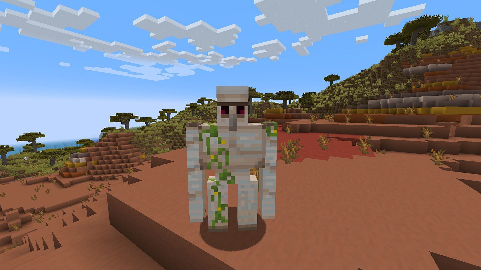 A crafted iron golem in a badlands biome (Image via Minecraft)