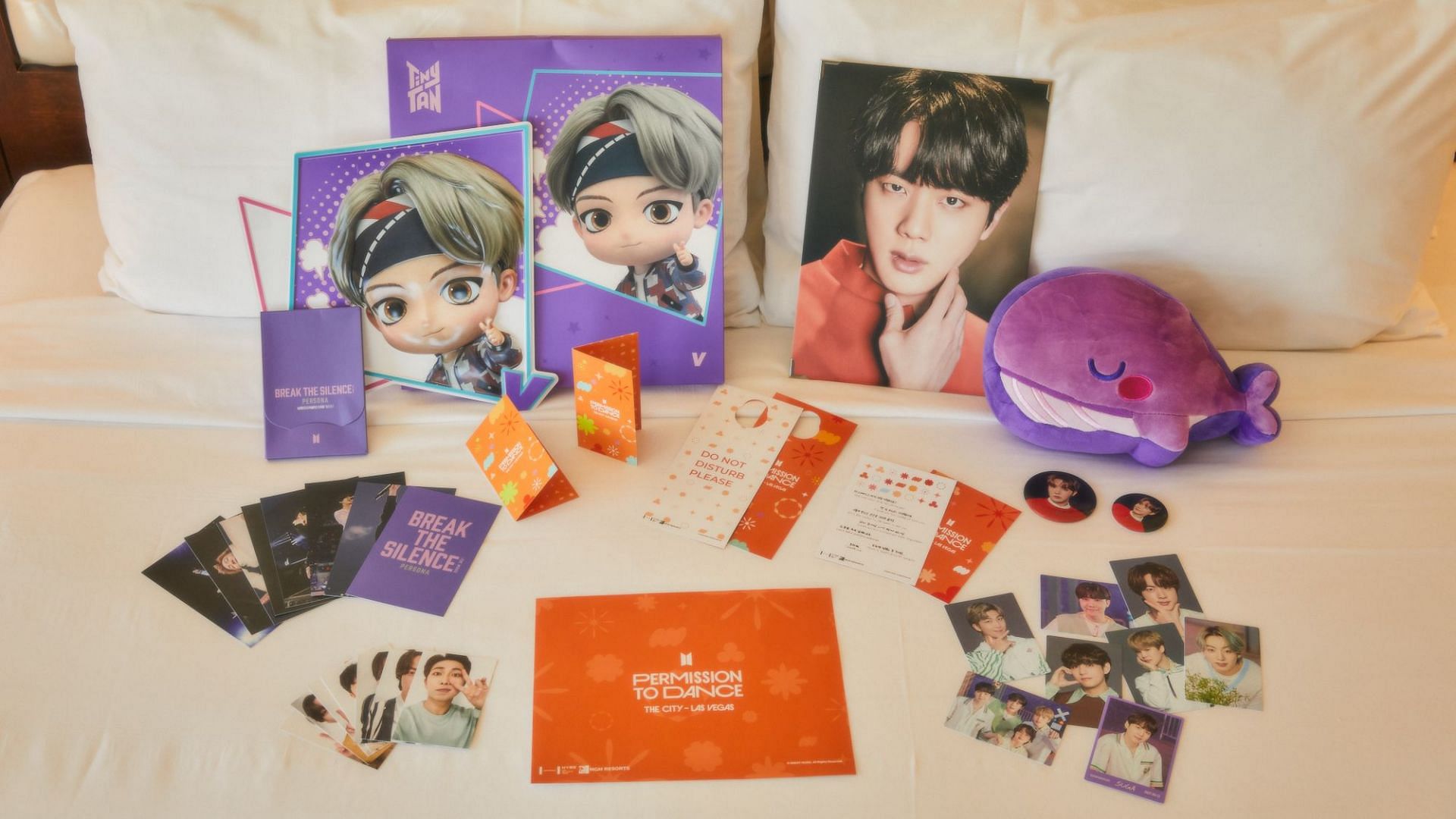 Closeup of a BTS themed room with exclusive souvenirs (Image via HYBE Corp.)