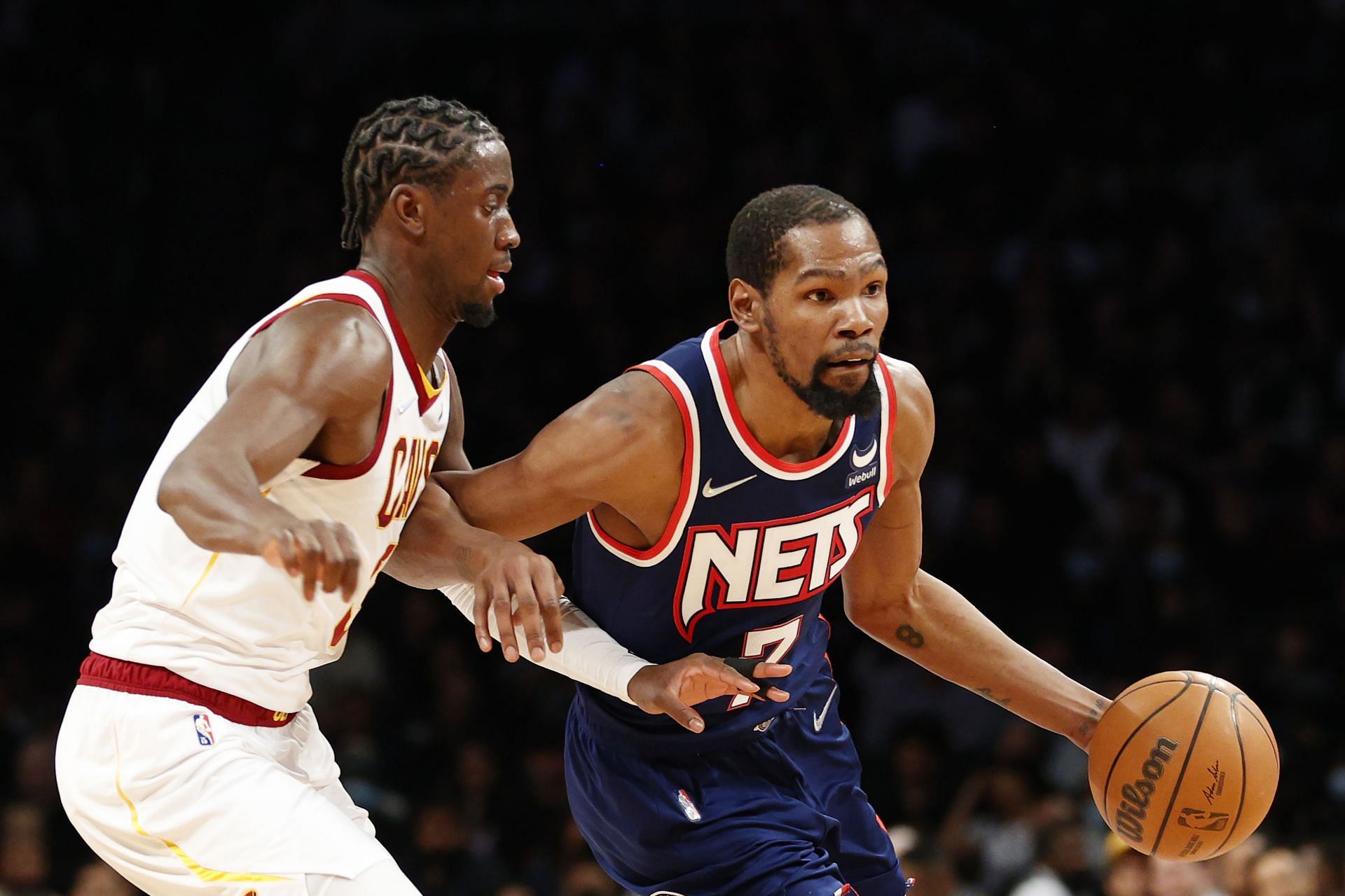 Caris LeVert of the Cleveland Cavaliers tries to guard Kevin Durant of the Brooklyn Nets.