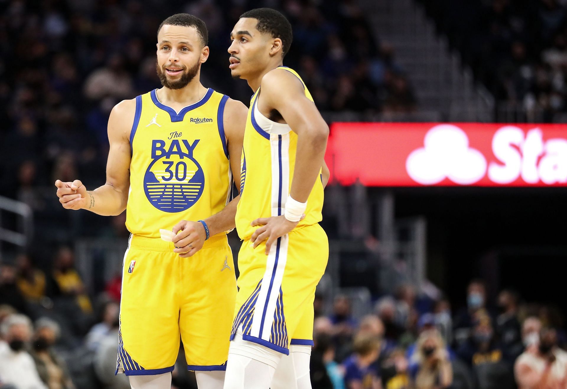 Steph Curry (left) and Jordan Poole of the Golden State Warriors