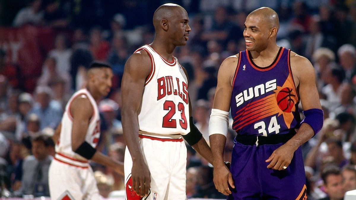 Charles Barkley and Michael Jordan in action