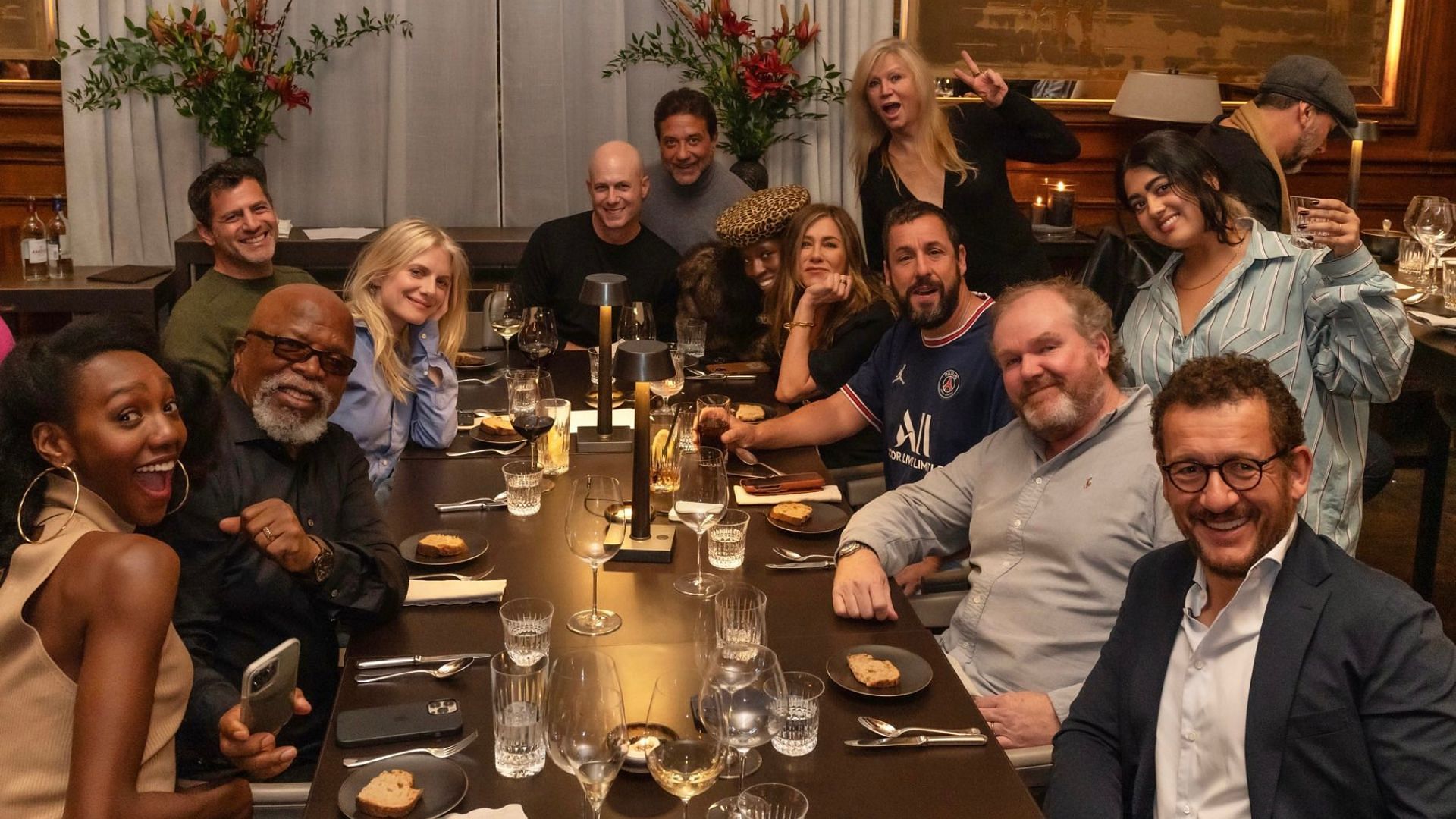 A glimpse of the Murder Mystery 2 cast dinner shared by producer Tripp Vinson (Image via @TrippVinson/Twitter)