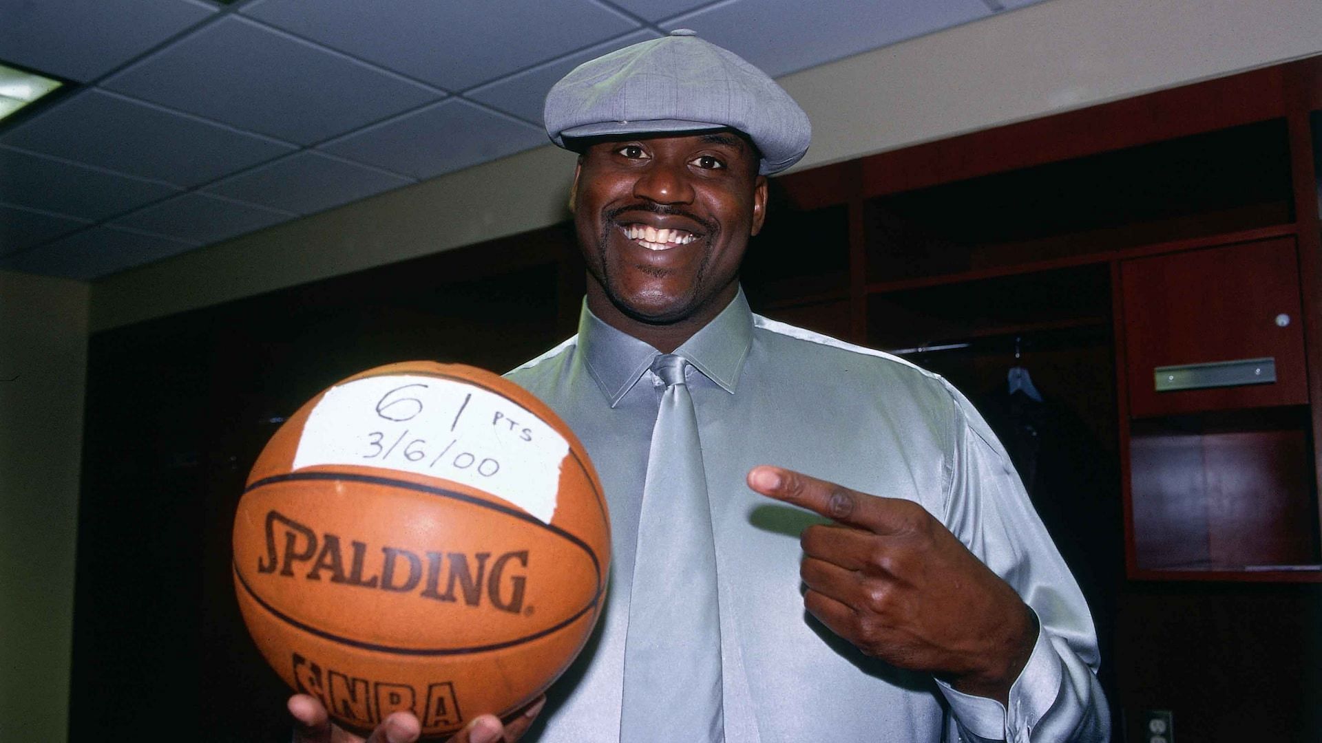 Shaquille O&#039;Neal with the game ball after scoring 61 points on his birthday