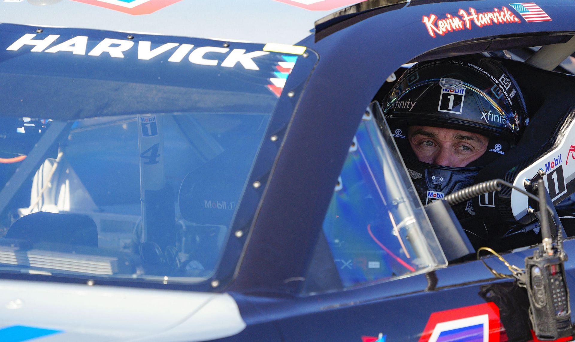 Kevin Harvick sits in his car during qualifying for the NASCAR Cup Series Toyota Owners 400 at Richmond Raceway.