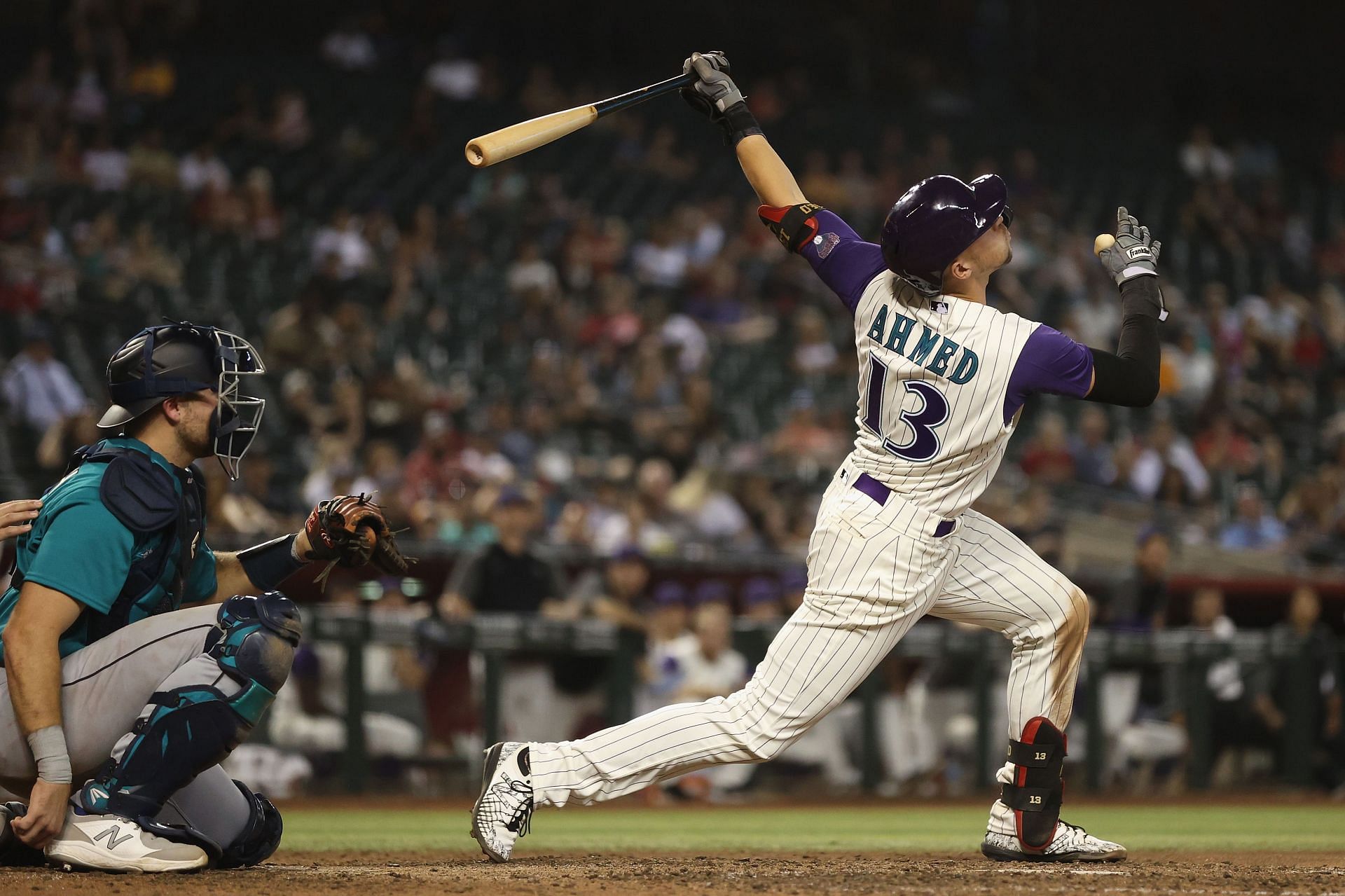 Nick Ahmed swings at a pitch during last years Mariners v Diamondbacks contest