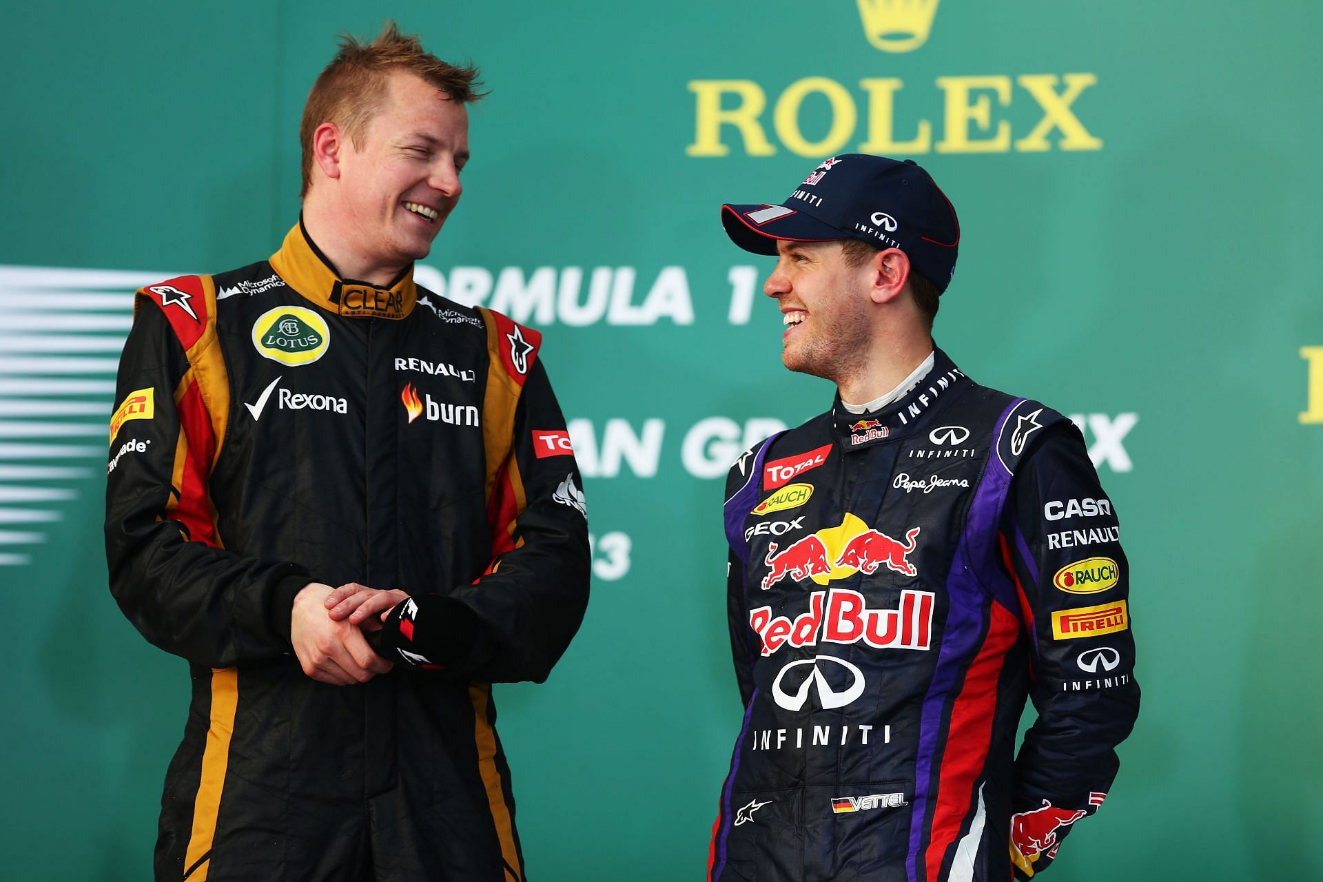 Kimi Raikkonen (left) was a popular winner in 2013