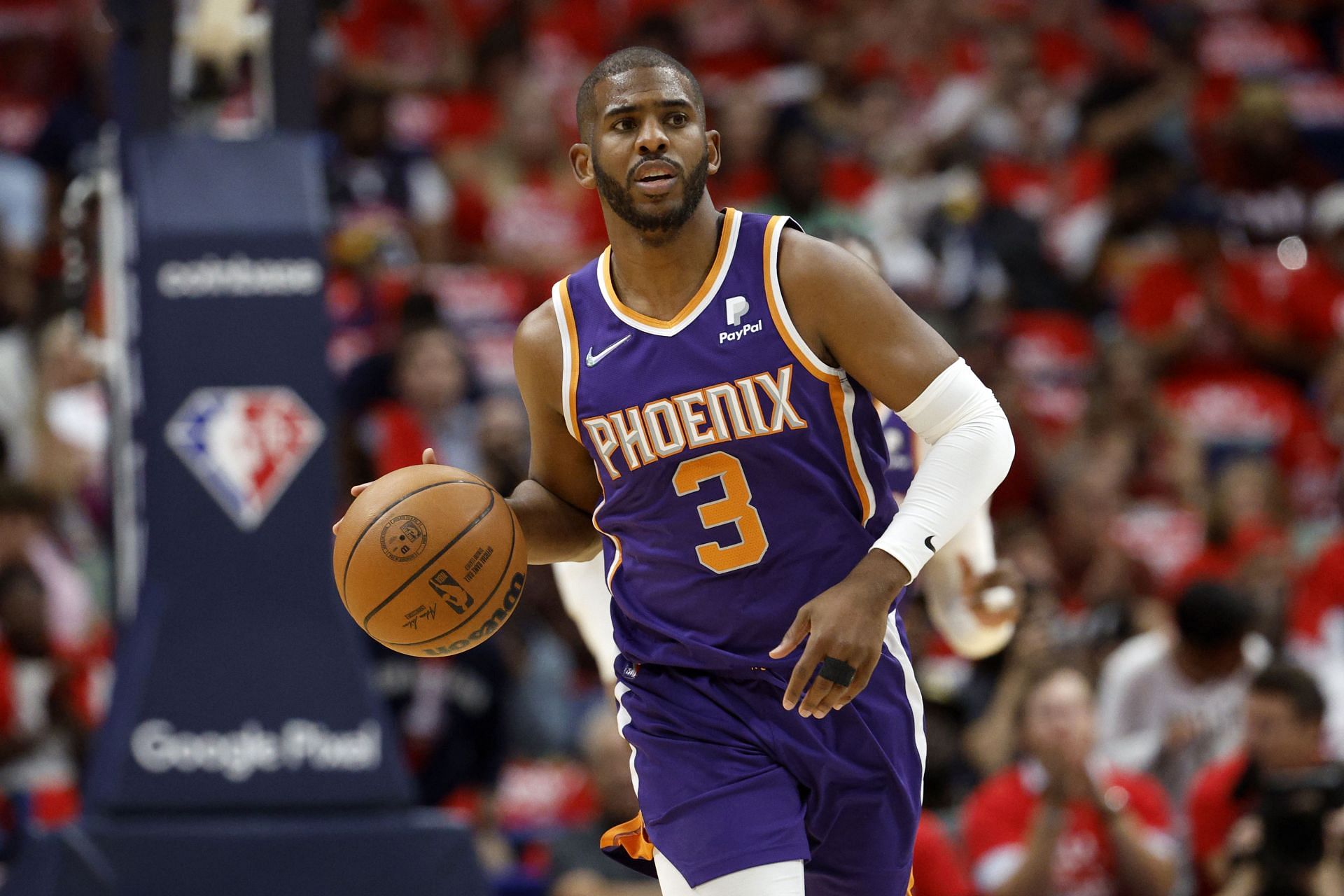 Chris Paul of the Phoenix Suns dribblers against the New Orleans Pelicans at Smoothie King Center on Thursday in New Orleans, Louisiana.