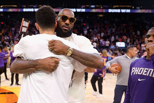 LA Lakers vs. Phoenix Suns: LeBron James hugging Devin Booker after Lakers' loss