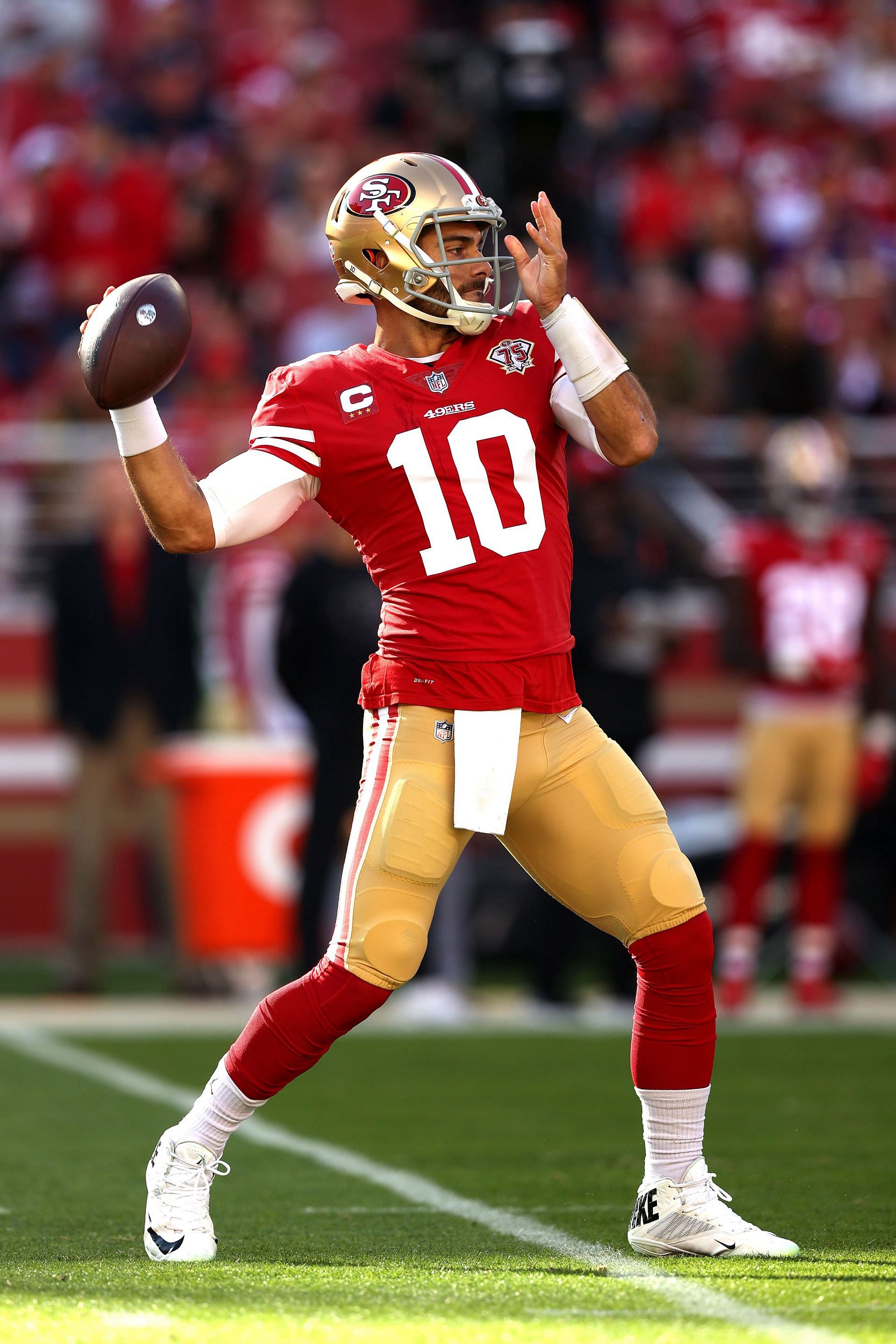 Garoppolo throwing a pass in the pocket for the San Francisco 49ers