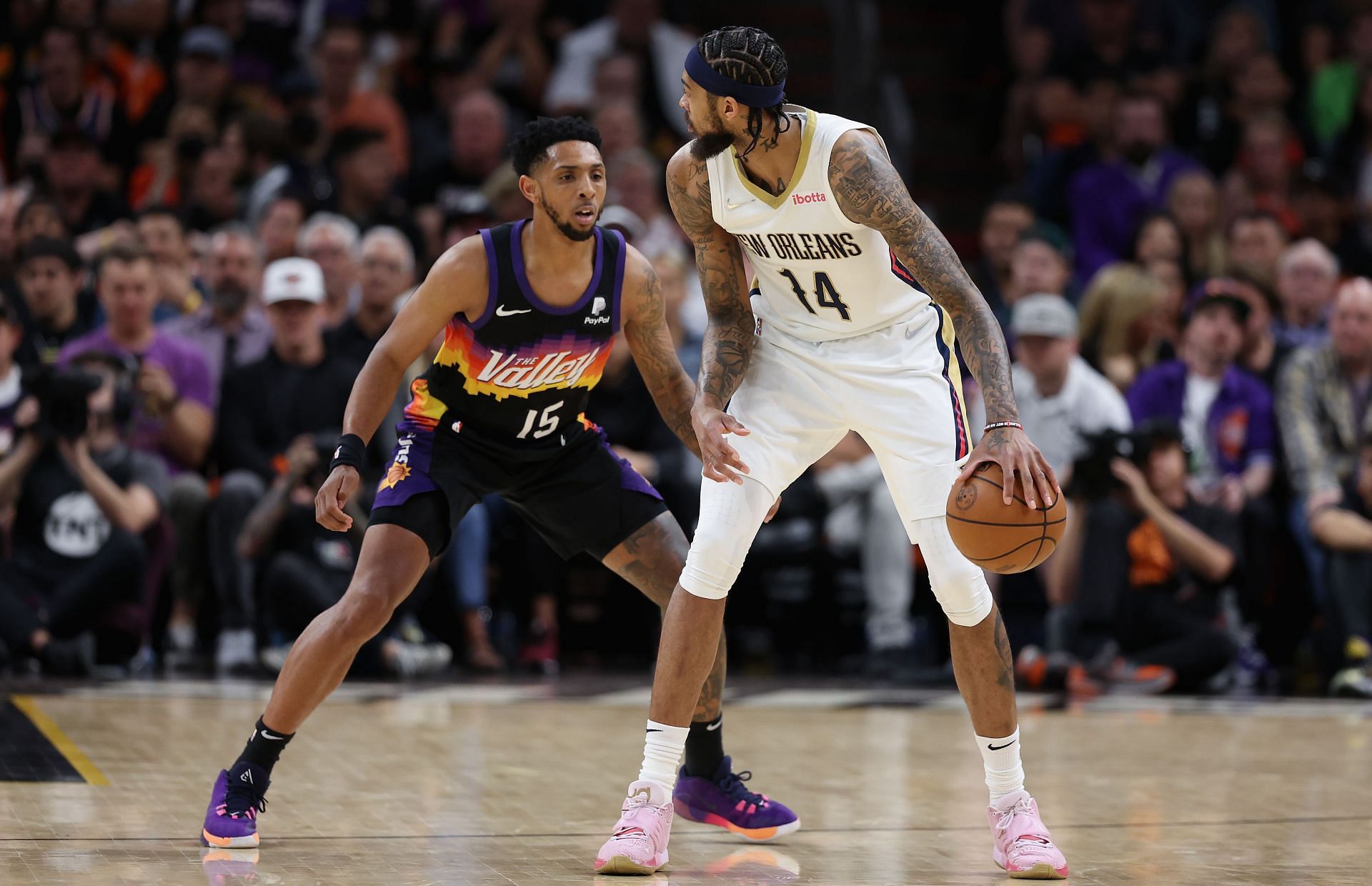 Brandon Ingram handles the ball against Cameron Payne.