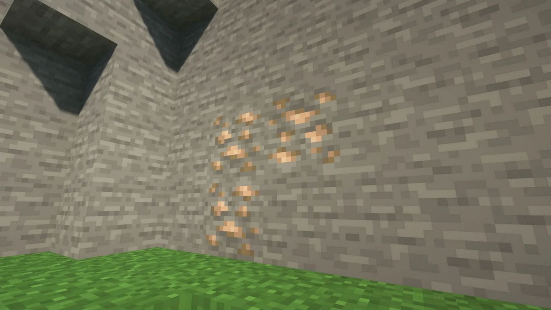 Iron ore has multiple spots of concentration when generating (Image via Mojang)