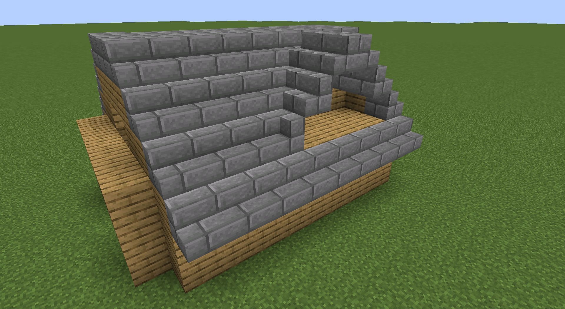 A smaller hut roof jutting over the main one (Image via Minecraft)