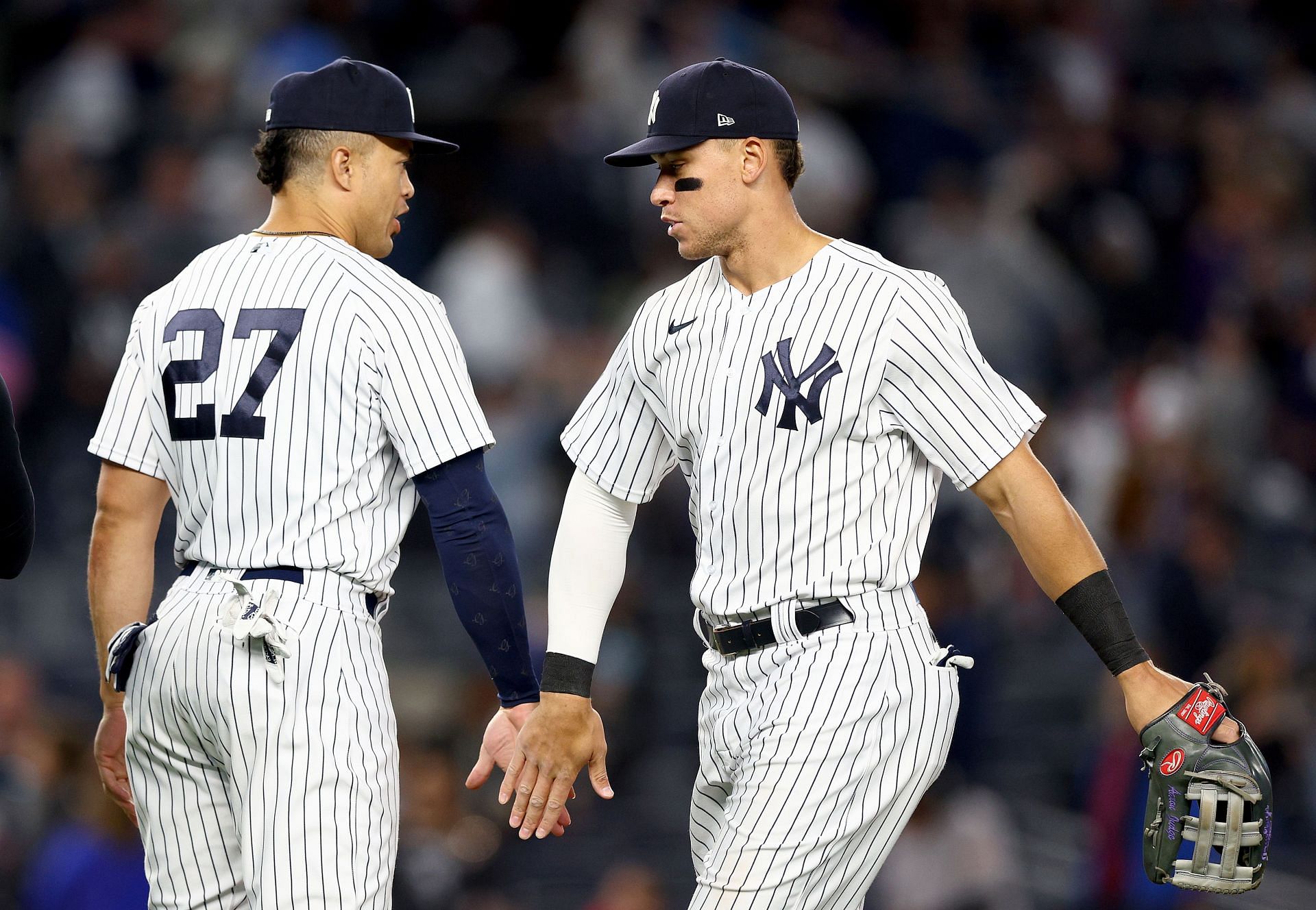 Giancarlo Stanton(left) and Aaron Judge(right) celebrate after a win against the Cleveland Guardians. Cleveland Guardians v New York Yankees