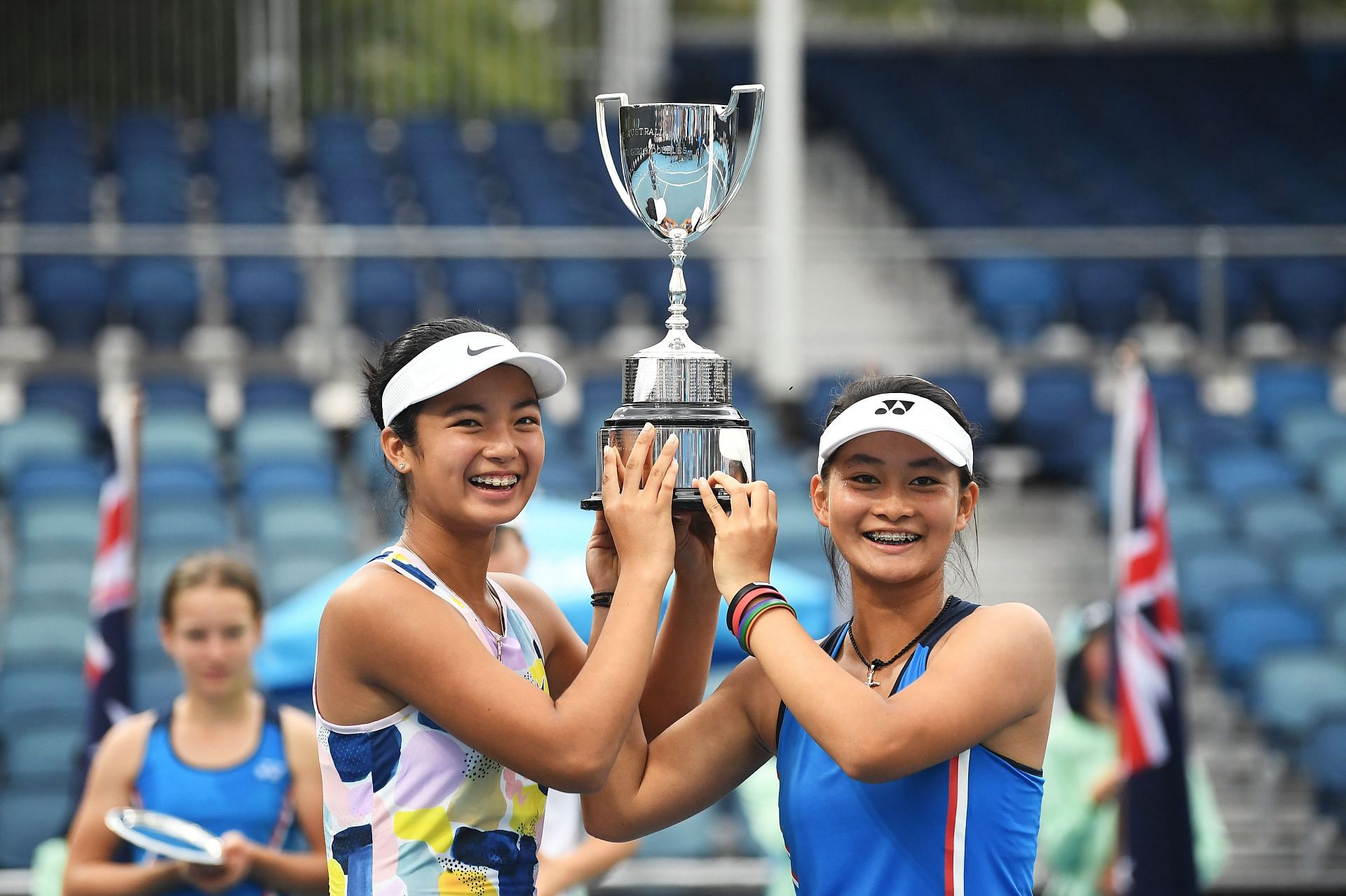 Alex Eala hoists her first doubles Grand Slam trophy together with partner Priska Madelyn Nugroho of Indonesia in the 2020 Australian Open