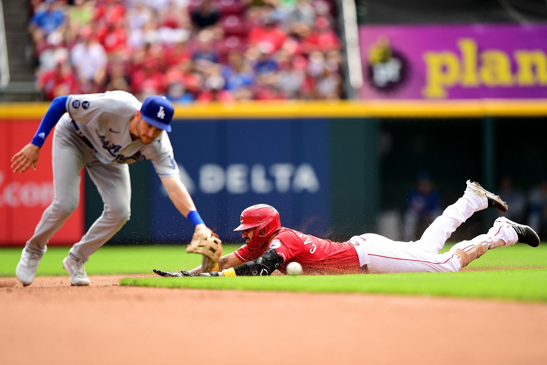 Victor Gonzalez of the Los Angeles Dodgers reacts to a Donovan Solano