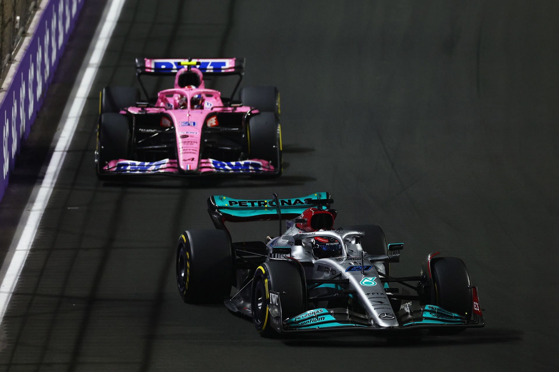 George Russell (#63) Mercedes W13 ahead of Esteban Ocon (#31) Alpine A521, 2022 Saudi Arabian GP